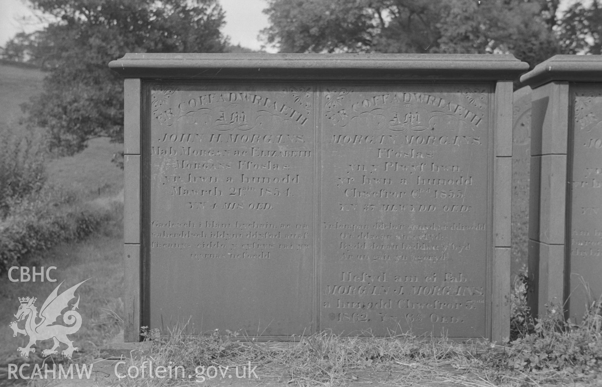 Digital copy of a black and white negative showing gravestone in memory of the Morgans family at St. Non's Church, Llanerchaeron. Photographed by Arthur O. Chater in September 1966.