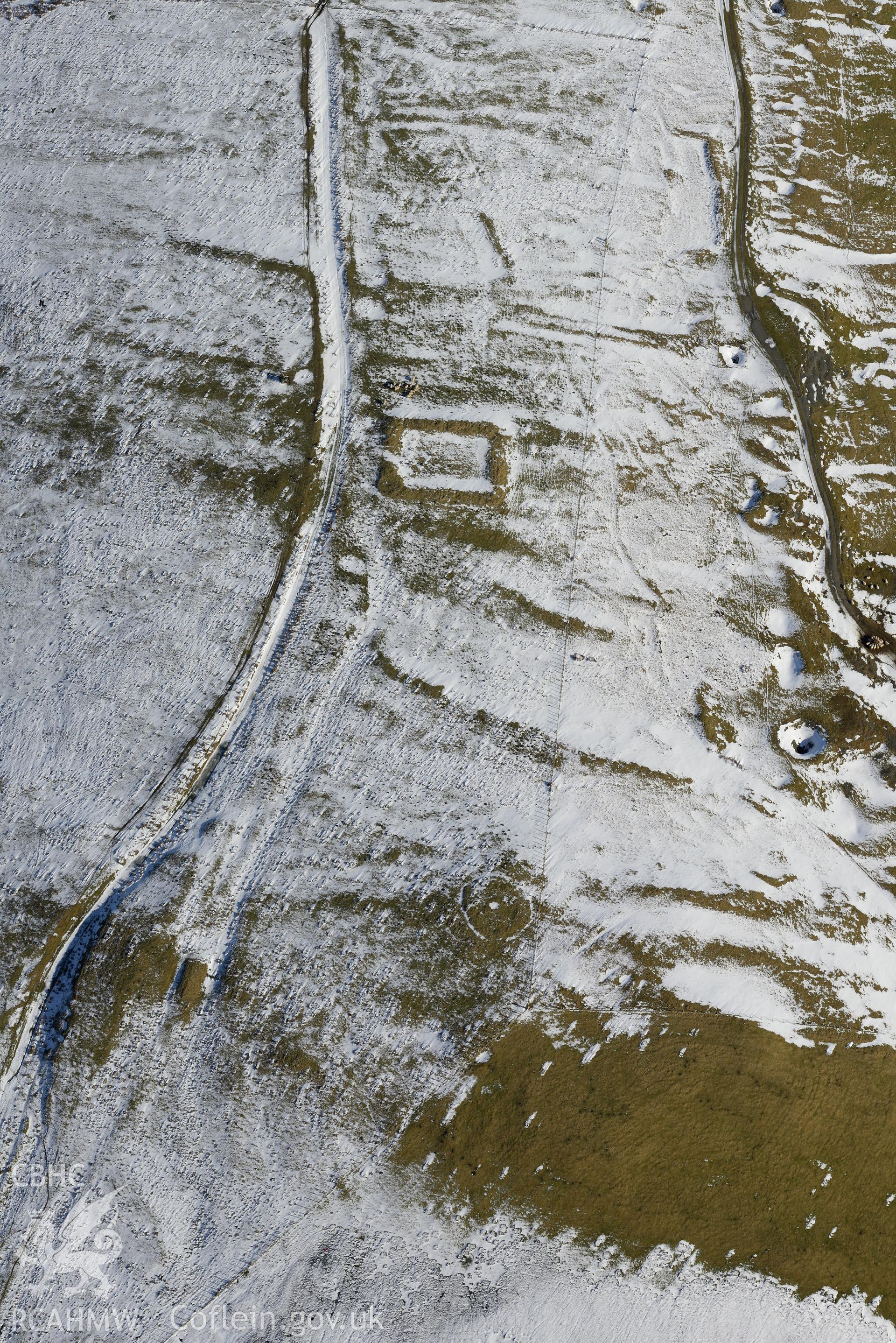 Pen y Crocbren Roman military settlement and gibbet mound, south west of Dylife, Machynlleth. Oblique aerial photograph taken during the Royal Commission's programme of archaeological aerial reconnaissance by Toby Driver on 4th February 2015.