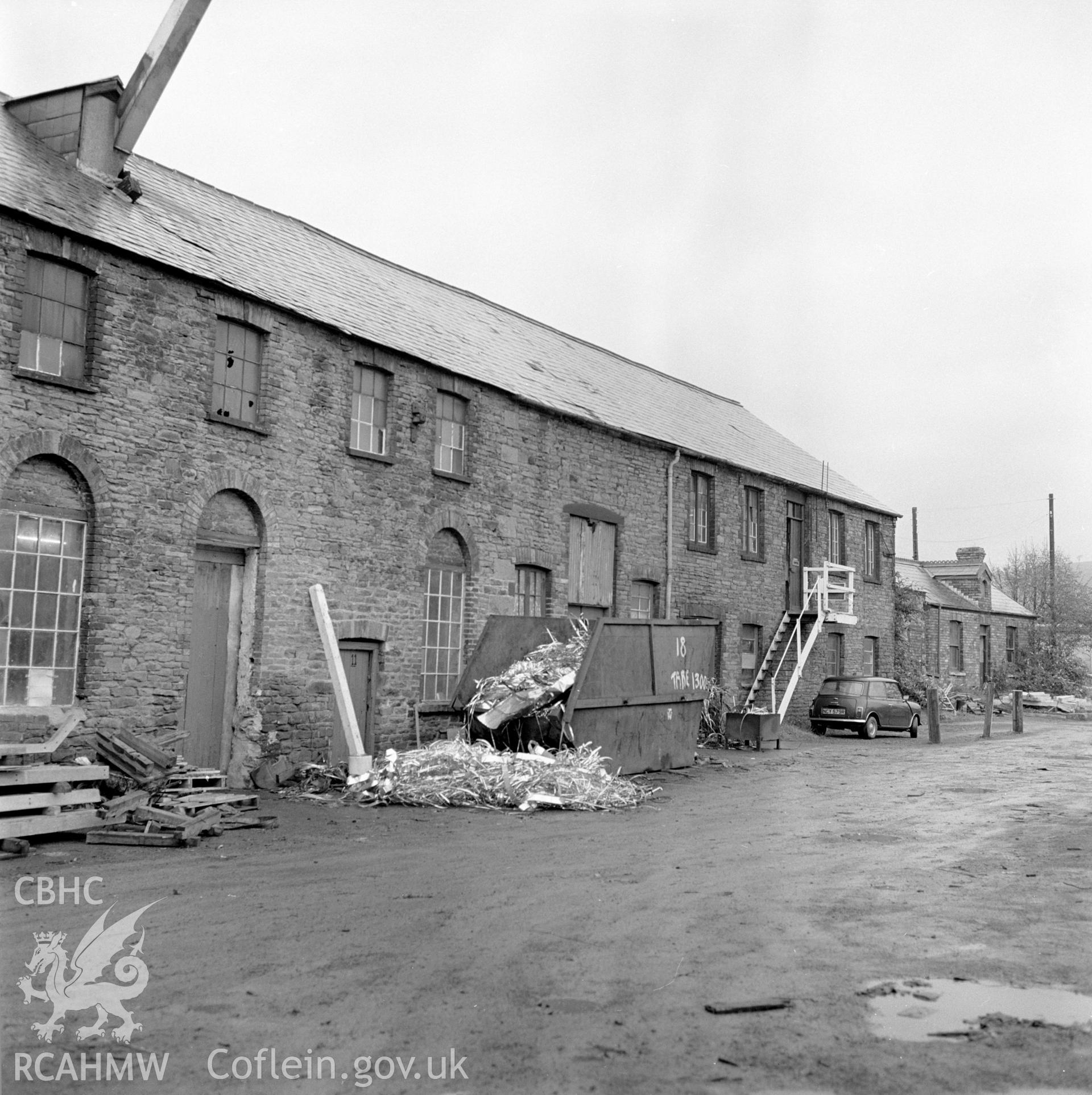 Digital copy of a black and white negative showing the building housing the crane at Player's Works Foundry, Clydach, taken by RCAHMW, undated