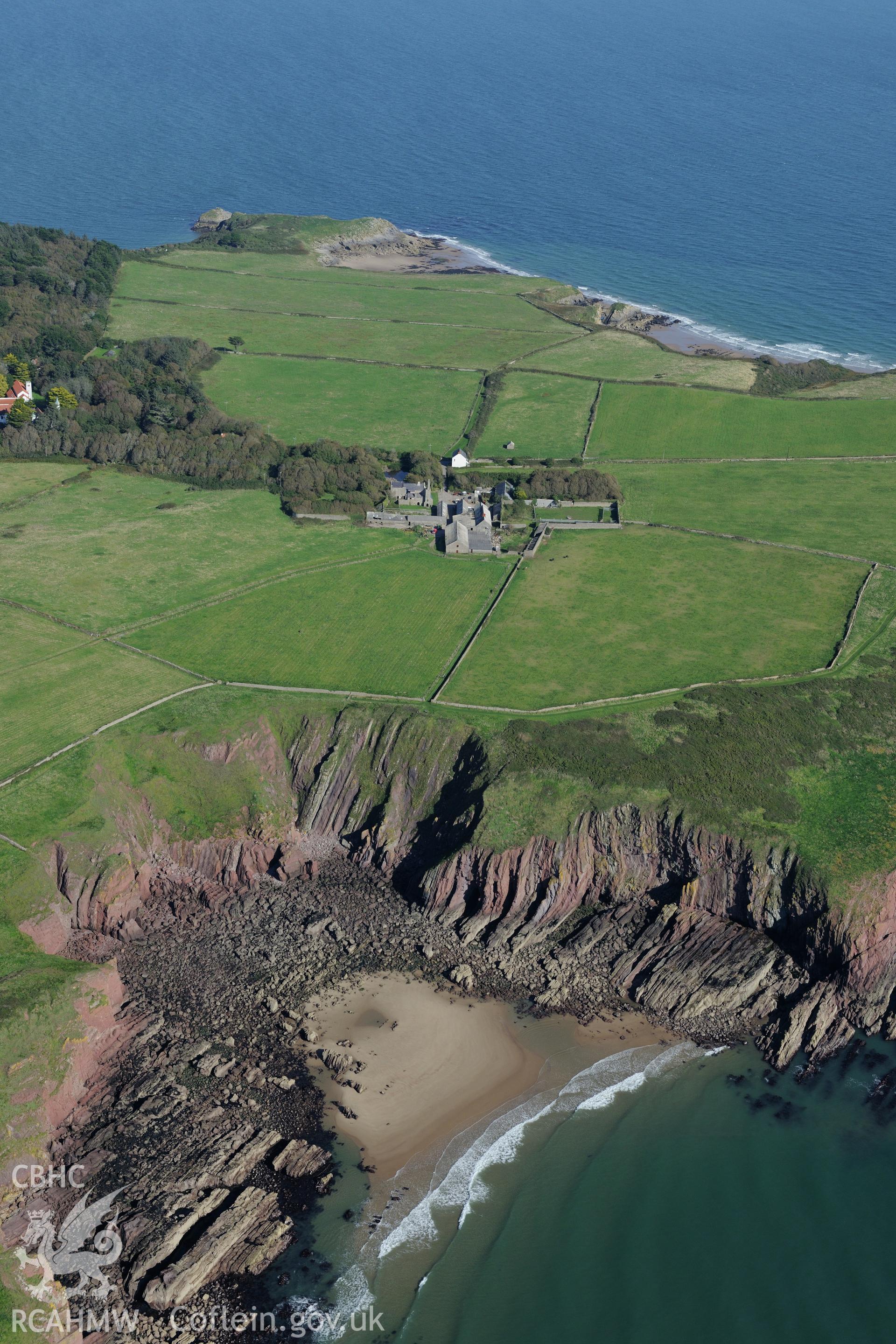 St. Mary's priory and the Old Priory Guest House on Caldey Island, off the south western coast of Tenby. Oblique aerial photograph taken during the Royal Commission?s programme of archaeological aerial reconnaissance by Toby Driver on 30th September 2015.