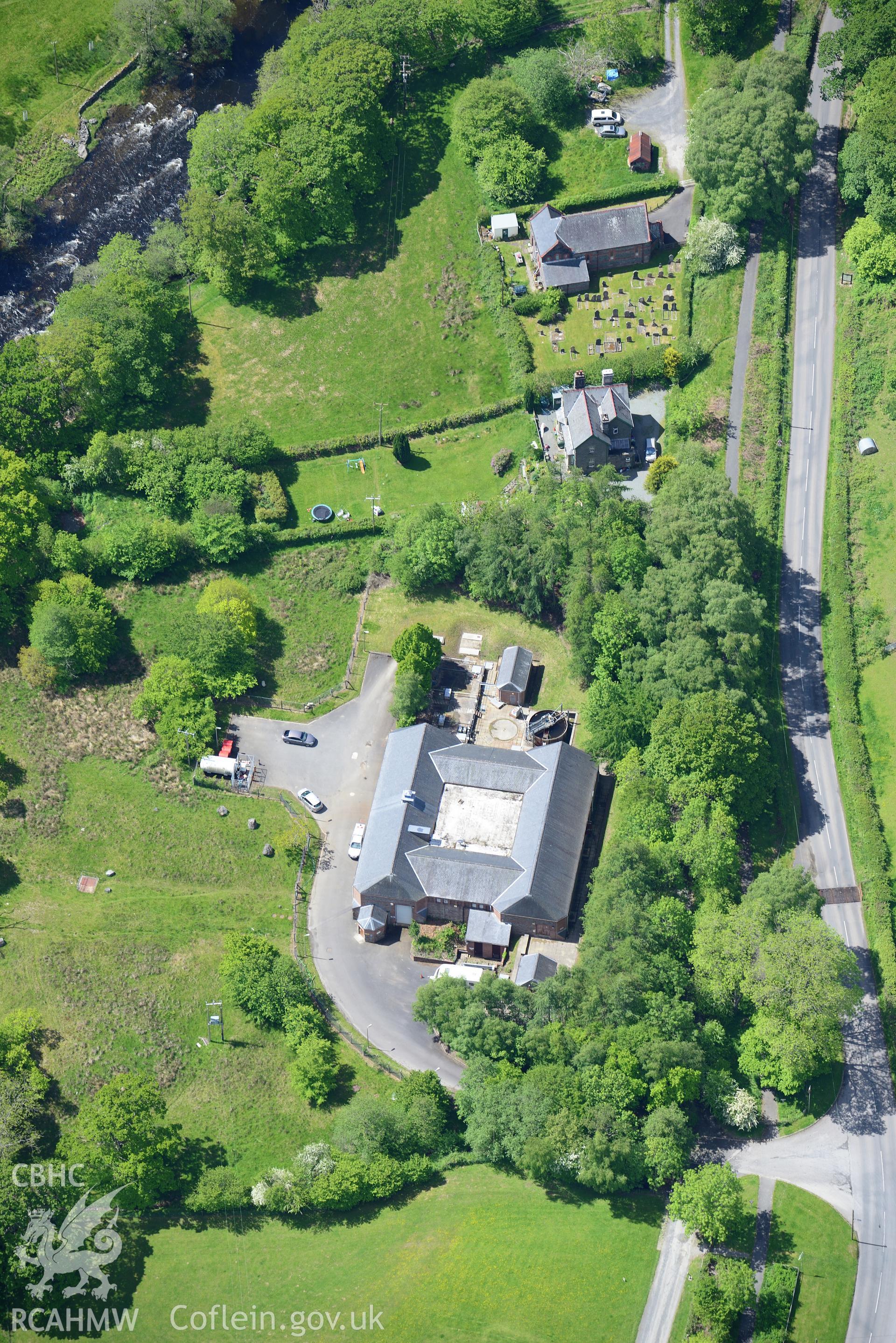 Kingsfield House and Bethania Baptist chapel at Elan Village, Birmingham Corporation Waterworks model village. Oblique aerial photograph taken during the Royal Commission?s programme of archaeological aerial reconnaissance by Toby Driver on 3rd June 2015.
