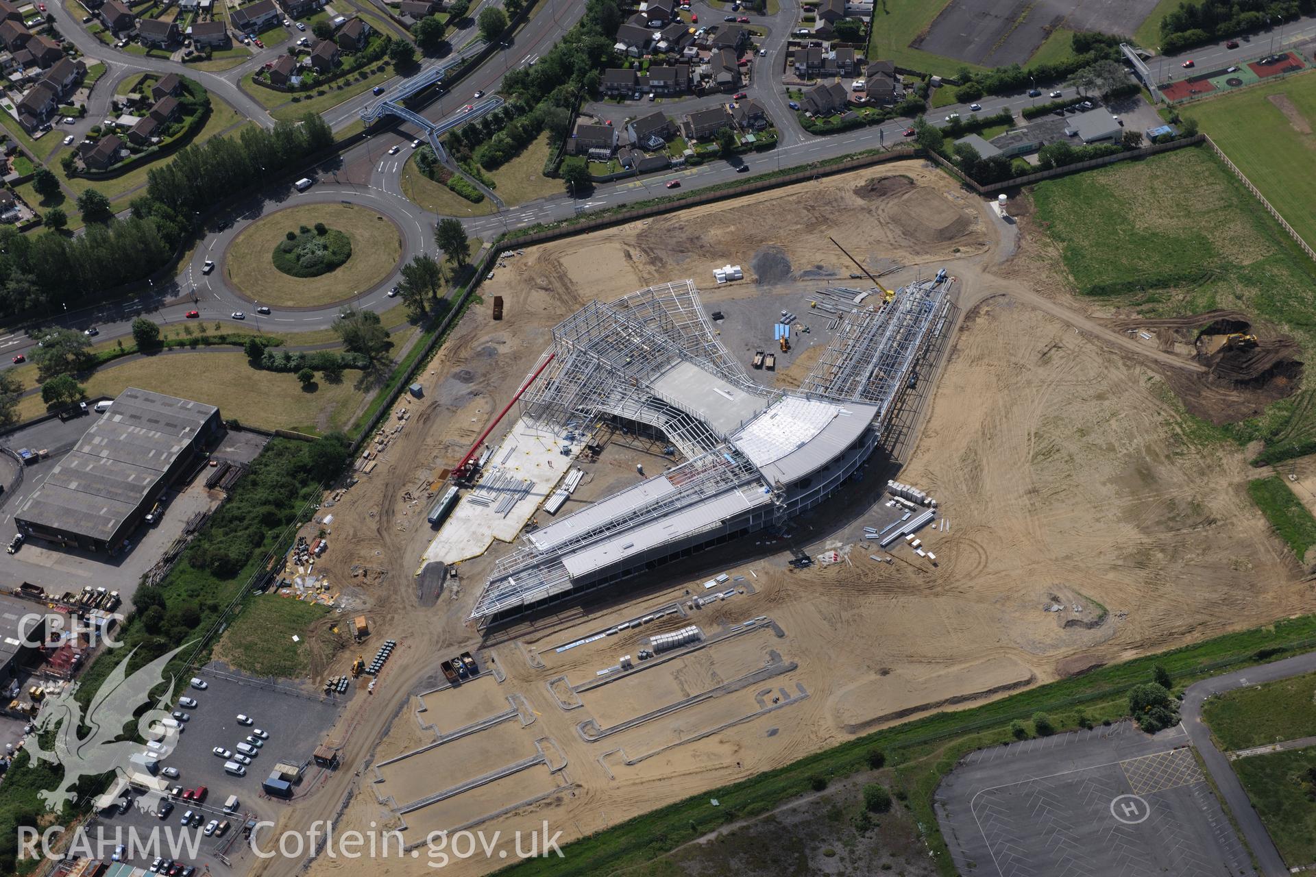 Ysgol Bae Baglan under construction. Oblique aerial photograph taken during the Royal Commission's programme of archaeological aerial reconnaissance by Toby Driver on 19th June 2015.