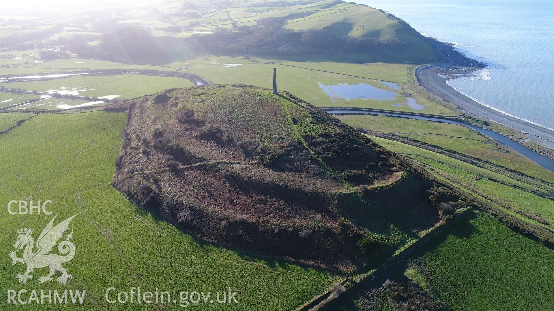View of south fort from north-east. CHERISH Project DJI drone photo survey of Pen Dinas Hillfort and the Wellington Monument. ? Crown: CHERISH PROJECT 2017. Produced with EU funds through the Ireland Wales Co-operation Programme 2014-2020. All material made freely available through the Open Government Licence.