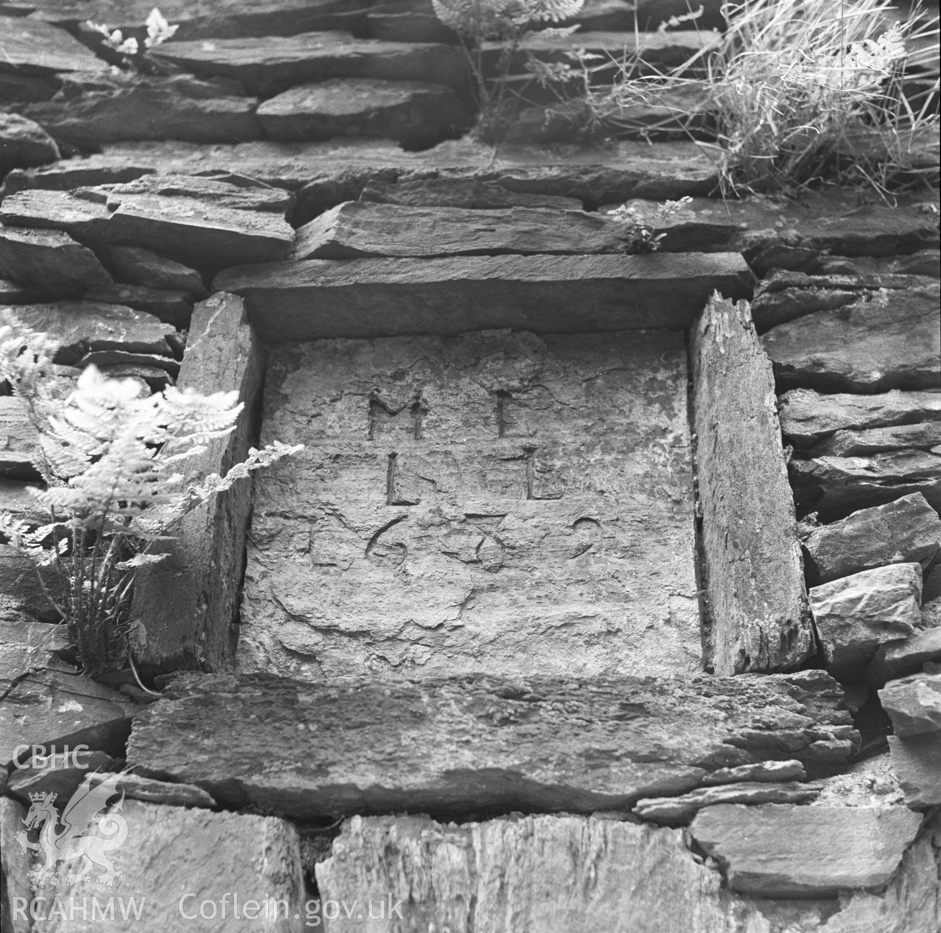 Digital copy of a negative showing view of datestone at Cefn-Gwyn Old House.