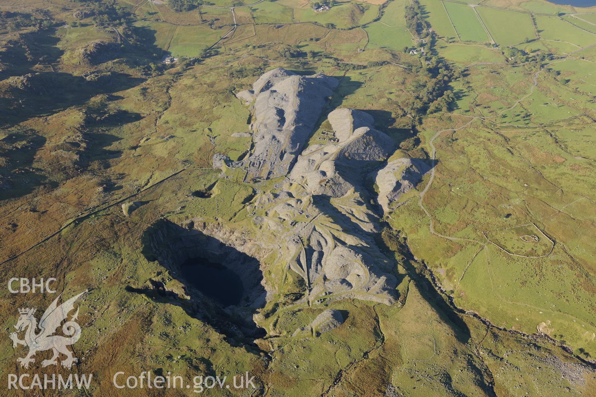Barracks at Glanrafon slate quarry, near Capel Garmon. Oblique aerial photograph taken during the Royal Commission's programme of archaeological aerial reconnaissance by Toby Driver on 2nd October 2015.