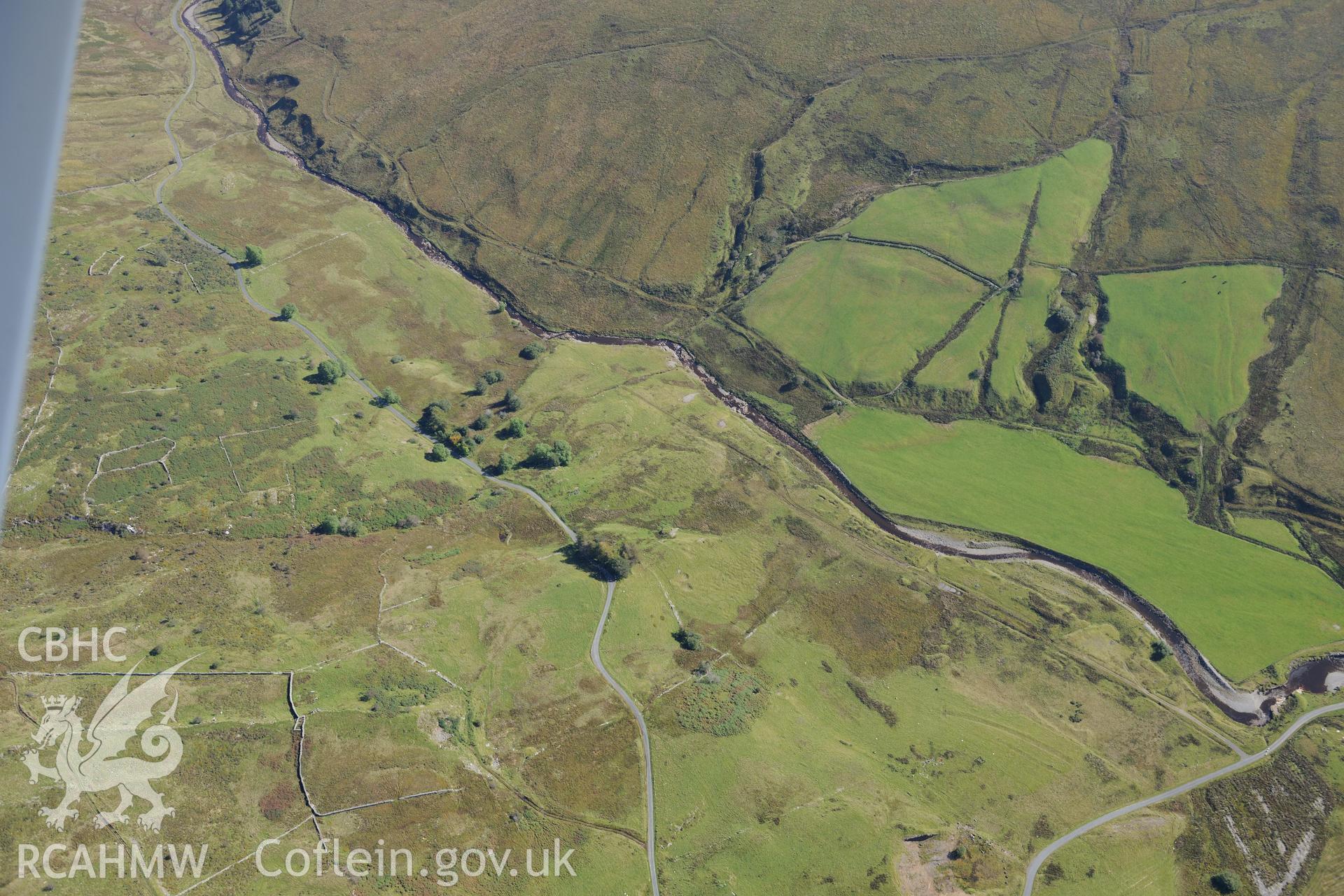 Structure at Gelli Gain; shelter, stock enclosure and trial mine north east of Gelli Gain and Bronaber firing range. Oblique aerial photograph taken during the Royal Commission's programme of archaeological aerial reconnaissance by Toby Driver on 2nd October 2015.