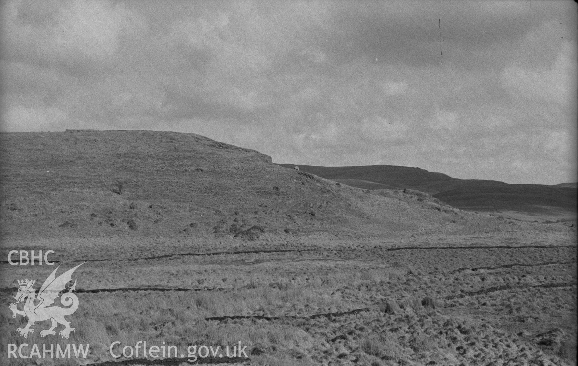 Digital copy of a black and white negative showing view of Pen Dinas, Elerch, with entrance on right. Photographed in April 1963 by Arthur O. Chater from Grid Reference SN 6764 8767, looking east. Panorama 3 of 3 photographs.