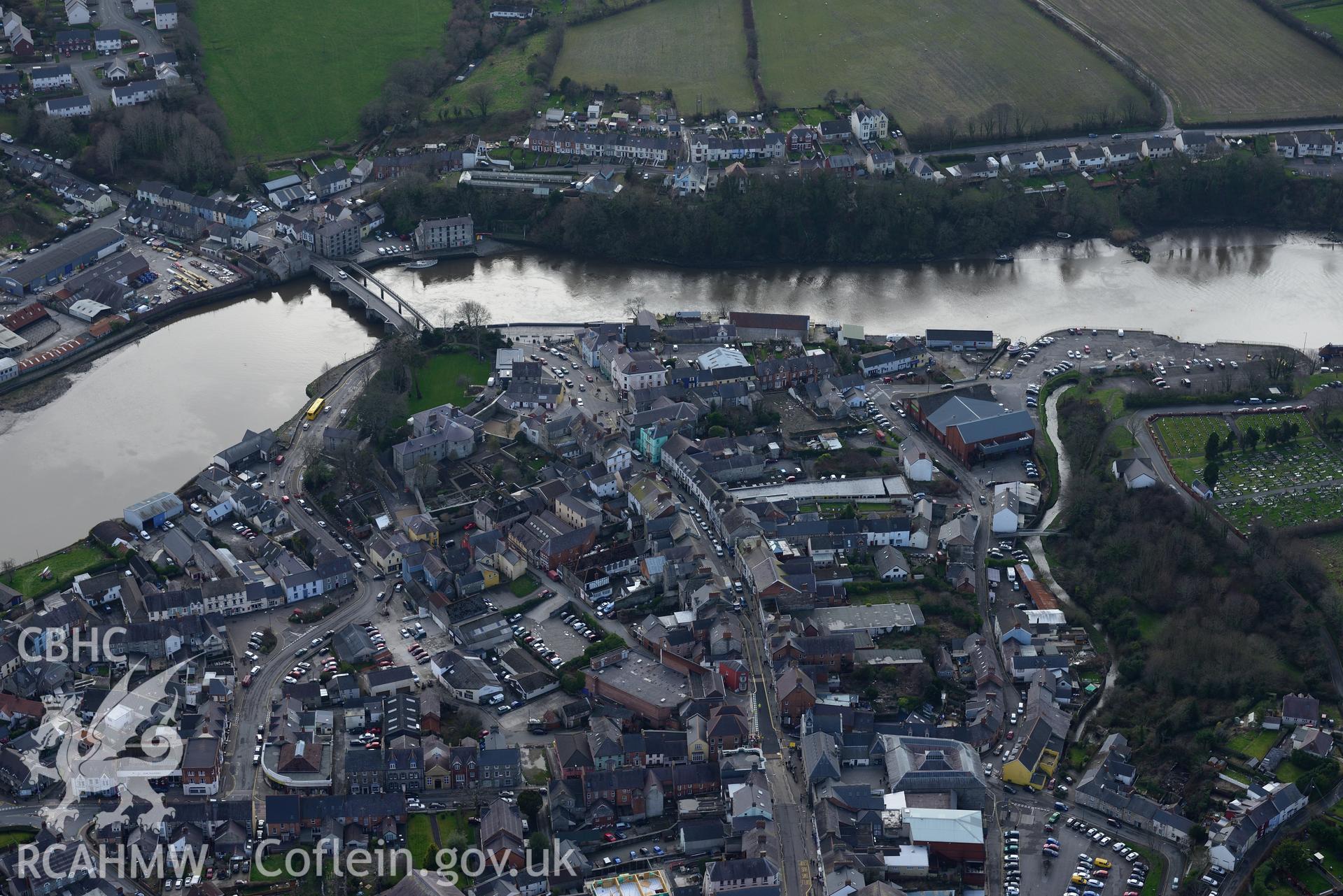Cardigan Castle and the castle house; Cardigan Bridge and the market hall, Cardigan. Oblique aerial photograph taken during the Royal Commission's programme of archaeological aerial reconnaissance by Toby Driver on 13th March 2015.