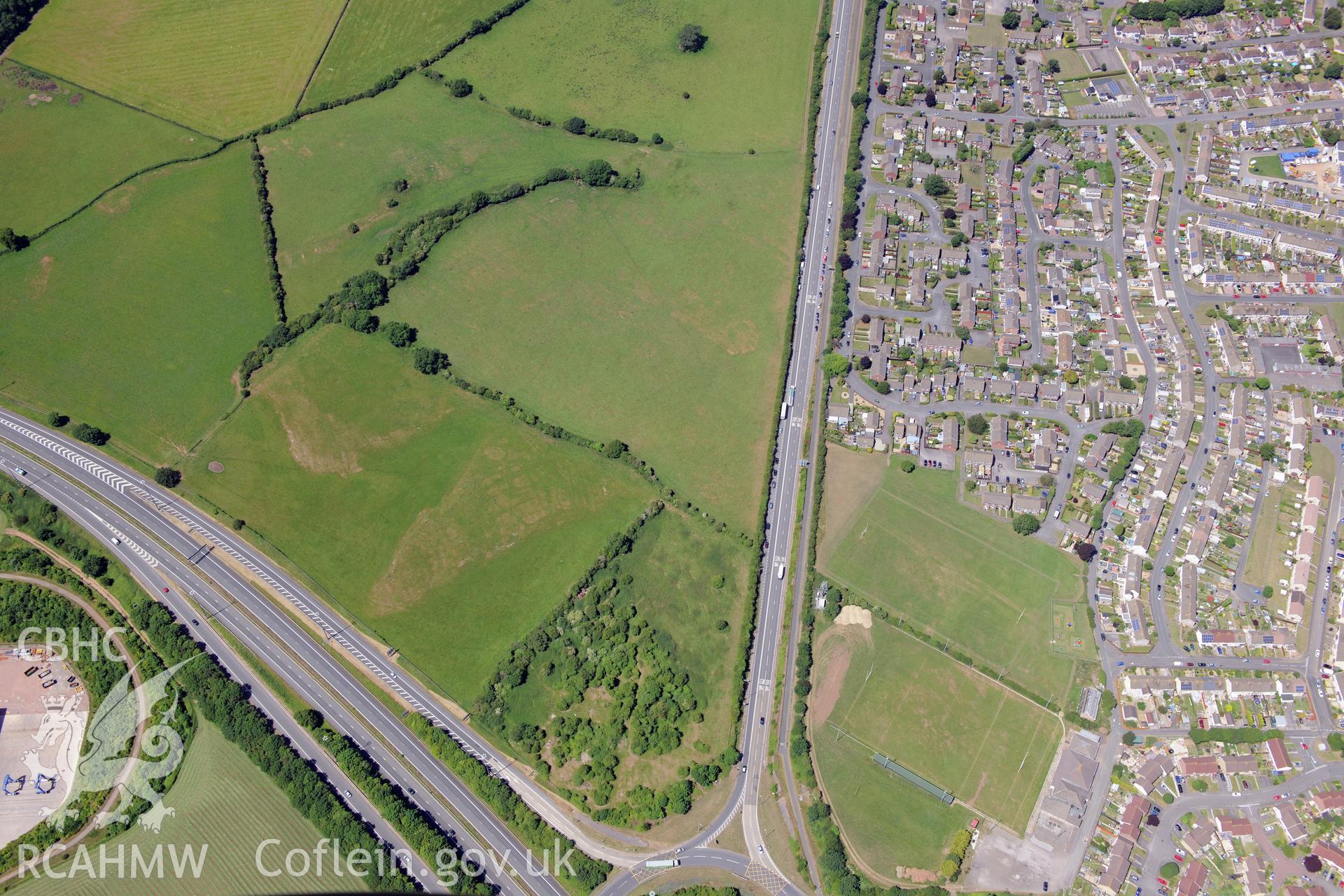 Upton Memorial Ground (home of Chepstow Rugby Football Club), Chepstow. Oblique aerial photograph taken during the Royal Commission's programme of archaeological aerial reconnaissance by Toby Driver on 29th June 2015.
