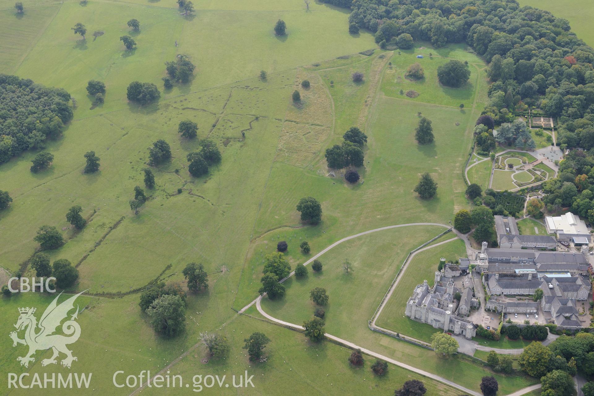 Bodelwyddan Castle, garden, and the army practise trenches in the park, near St. Asaph. Oblique aerial photograph taken during the Royal Commission's programme of archaeological aerial reconnaissance by Toby Driver on 11th September 2015.