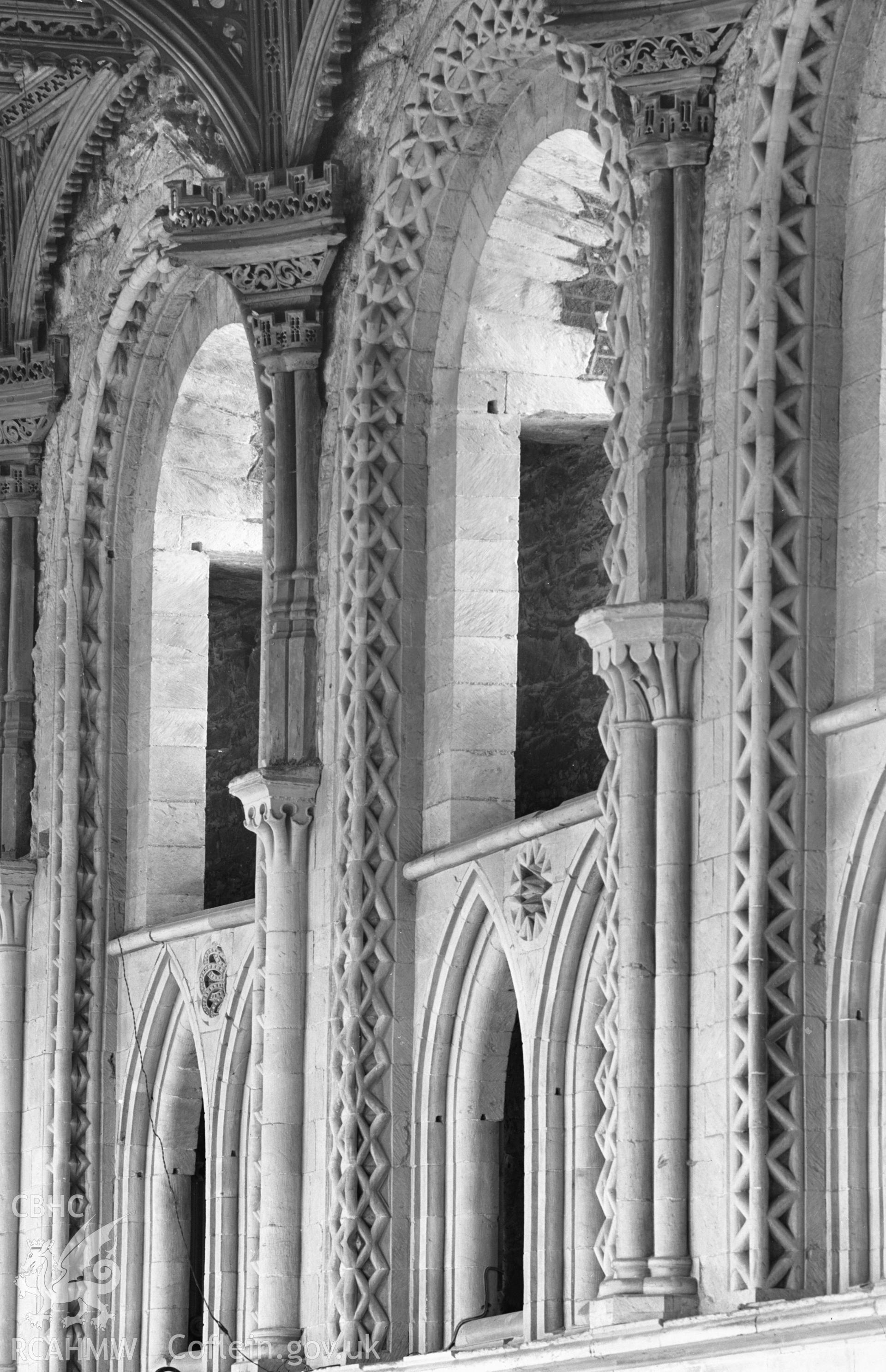 Digital copy of a black and white nitrate negative showing interior stonework decoration at St. David's Cathedral, taken by E.W. Lovegrove, July 1936.