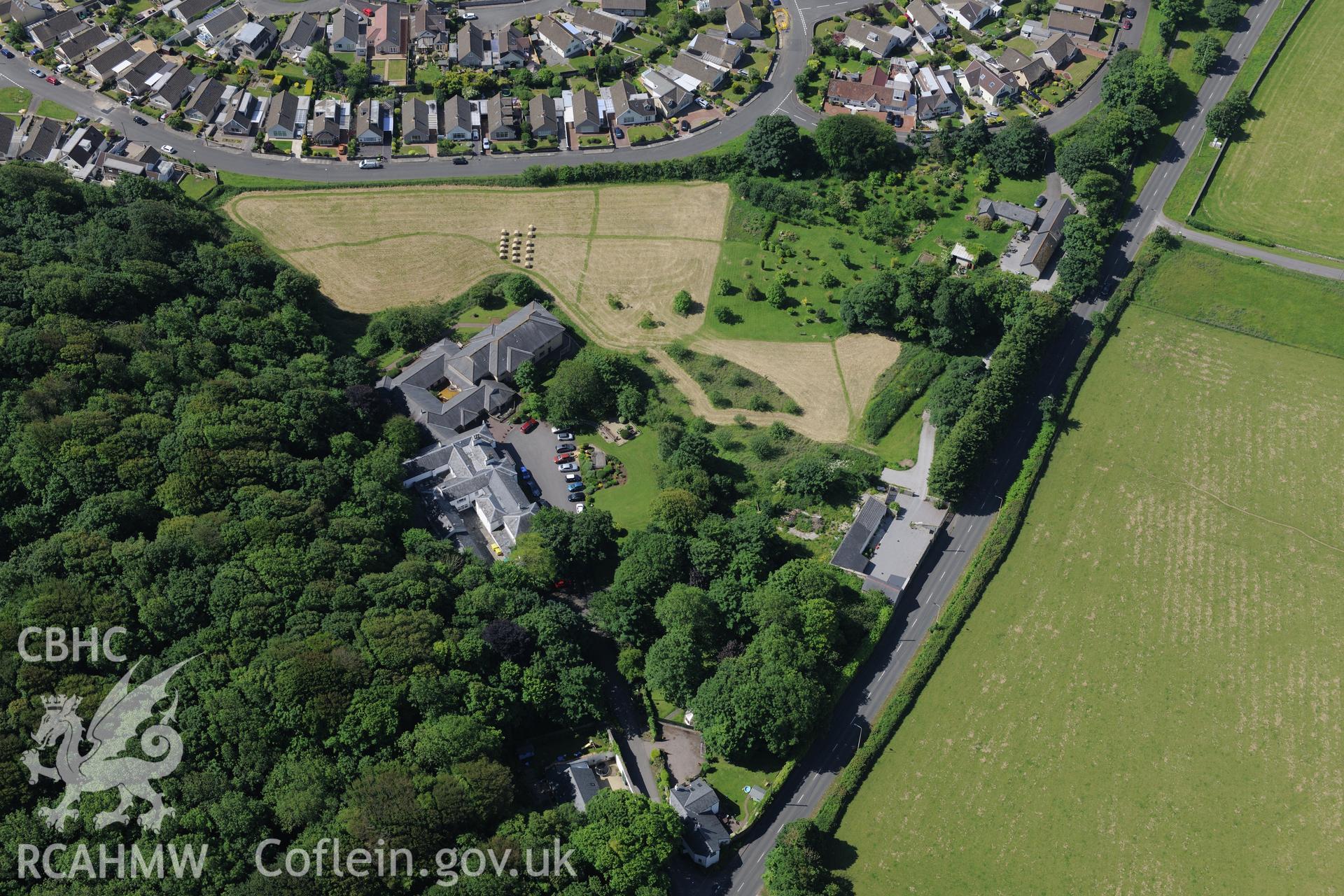Dan-y-Graig house and garden, and Dan-y-Graig Roman Villa. Oblique aerial photograph taken during the Royal Commission's programme of archaeological aerial reconnaissance by Toby Driver on 19th June 2015.