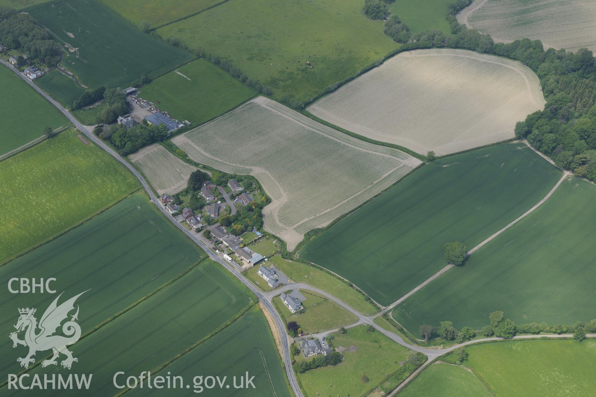 Walton Green vicarage and cursus. Oblique aerial photograph taken during the Royal Commission's programme of archaeological aerial reconnaissance by Toby Driver on 11th June 2015.