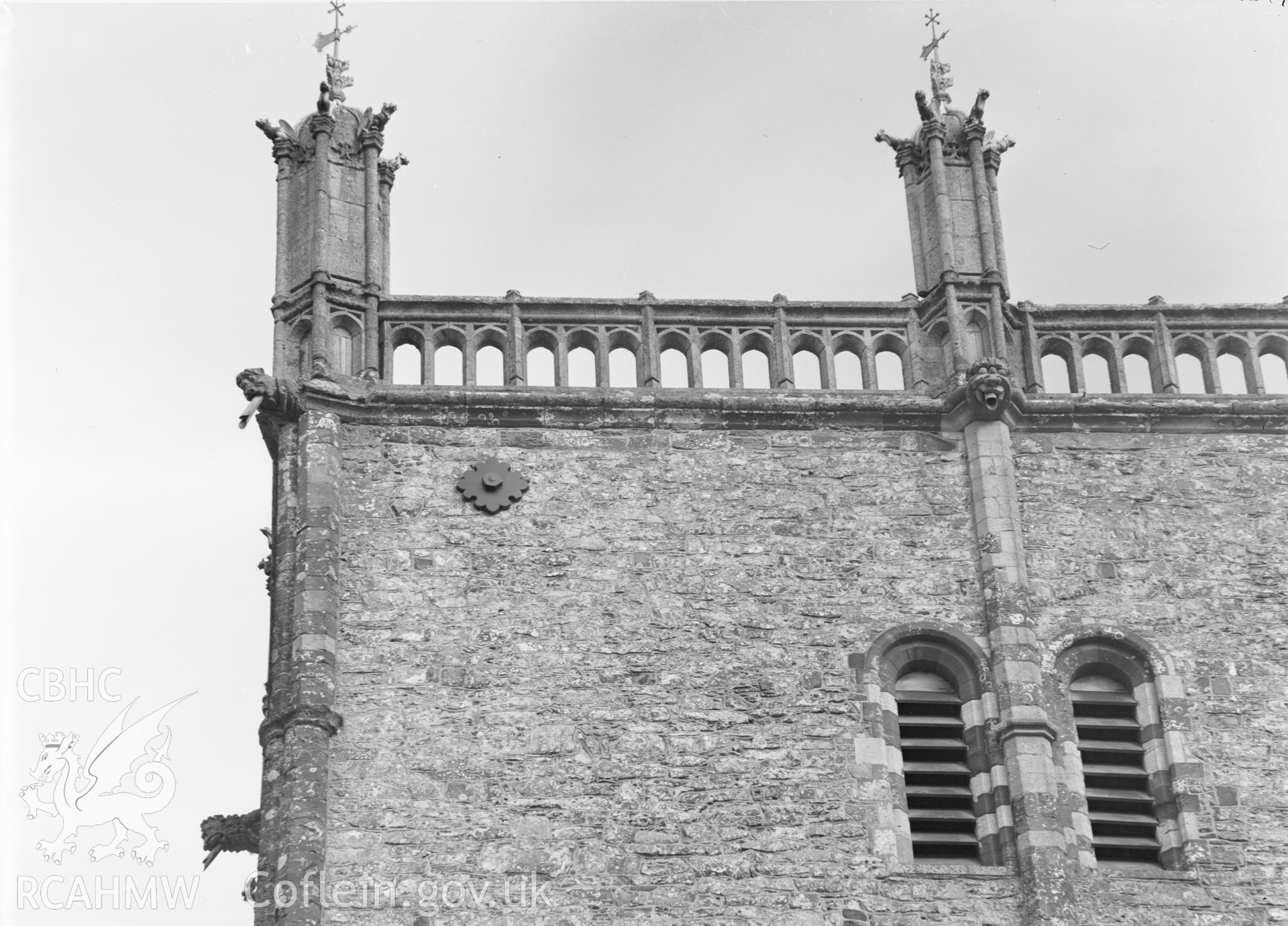 Digital copy of a black and white acetate negative showing exterior detail view of the tower at St. David's Cathedral, taken by E.W. Lovegrove, July 1936.