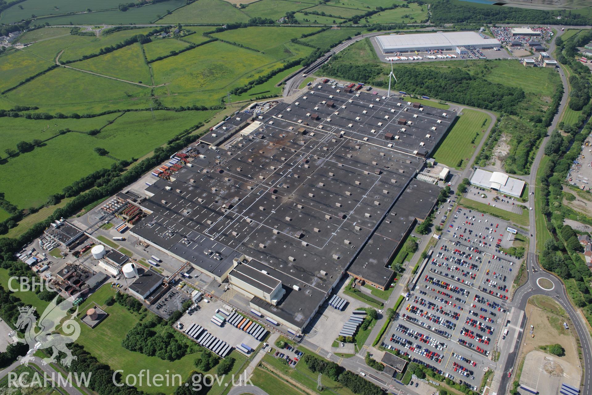 Waterton industrial estate, Bridgend. Oblique aerial photograph taken during the Royal Commission's programme of archaeological aerial reconnaissance by Toby Driver on 19th June 2015.