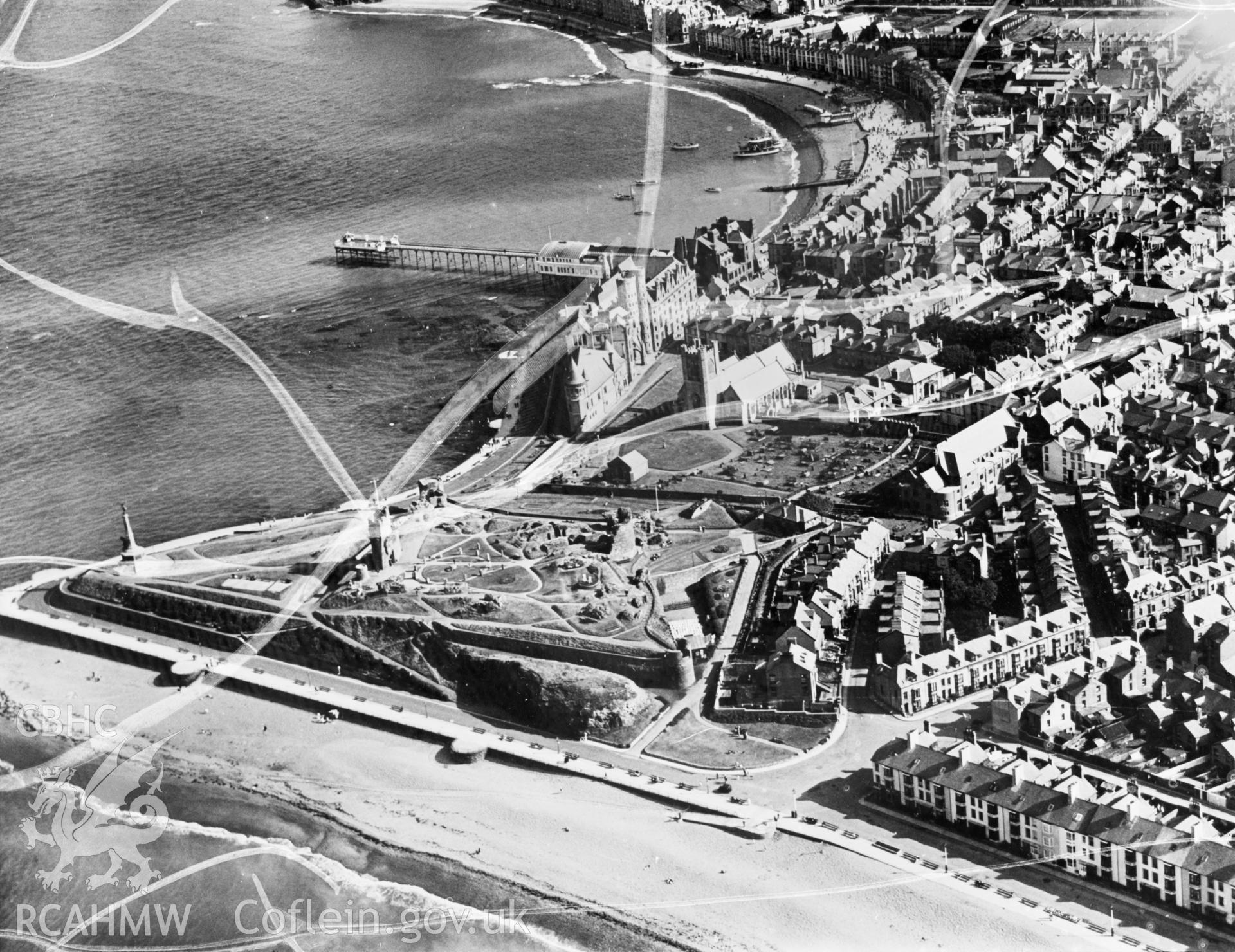 View of Aberystwyth showing castle and New Promenade area. Oblique aerial photograph, 5?x4? BW glass plate.