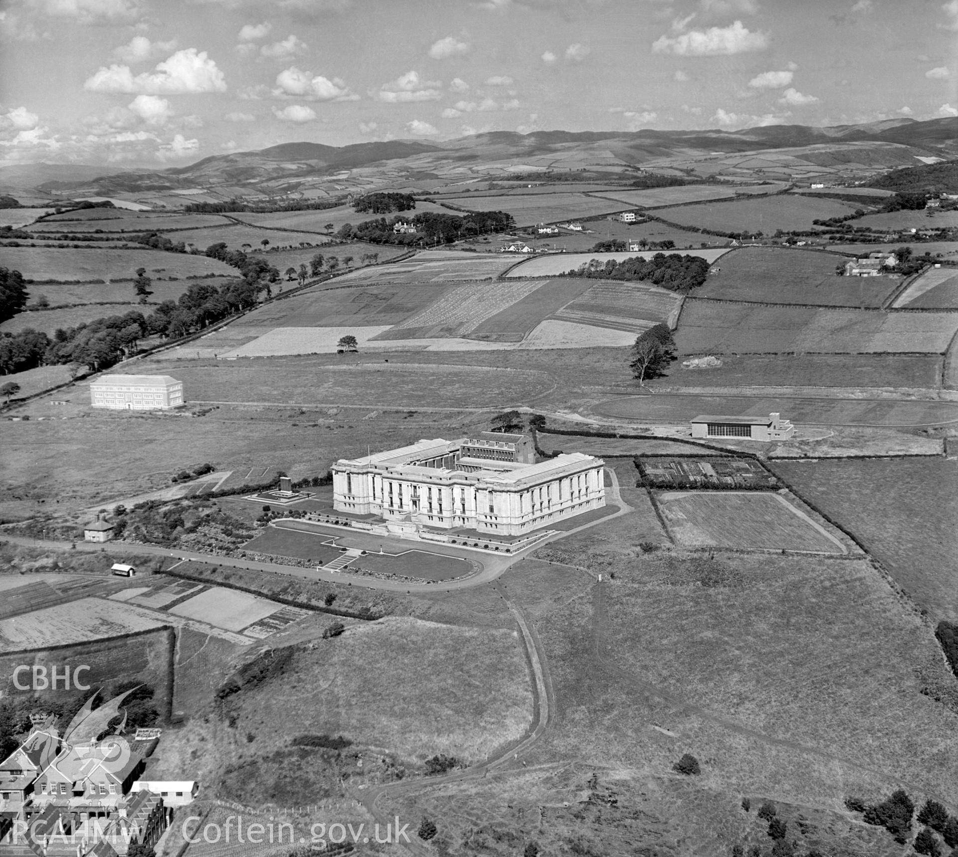Black and white oblique aerial photograph showing the National Library of Wales, Aberystwyth, from Aerofilms album 393 (Cardiganshire), taken by Aero Pictorial Ltd and dated 27 July 1947.