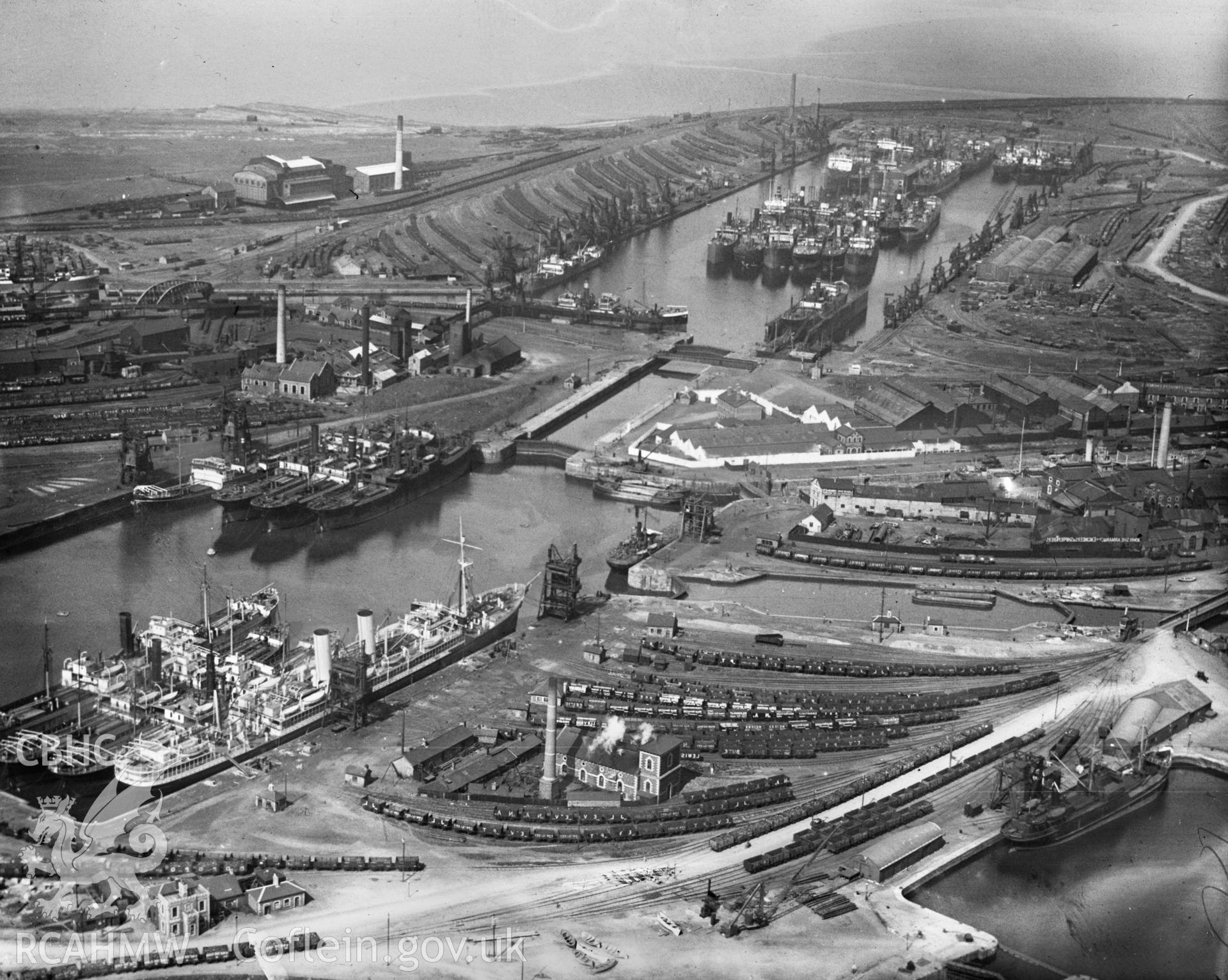 General view of Cardiff docks, oblique aerial view. 5?x4? black and white glass plate negative.