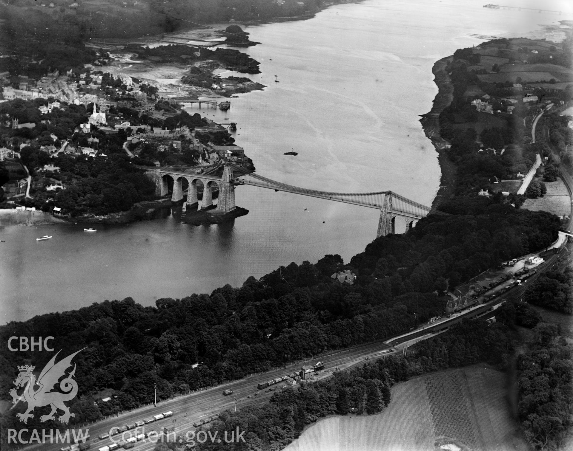 View of the Menai suspension bridge, Bangor, oblique aerial view. 5?x4? black and white glass plate negative.