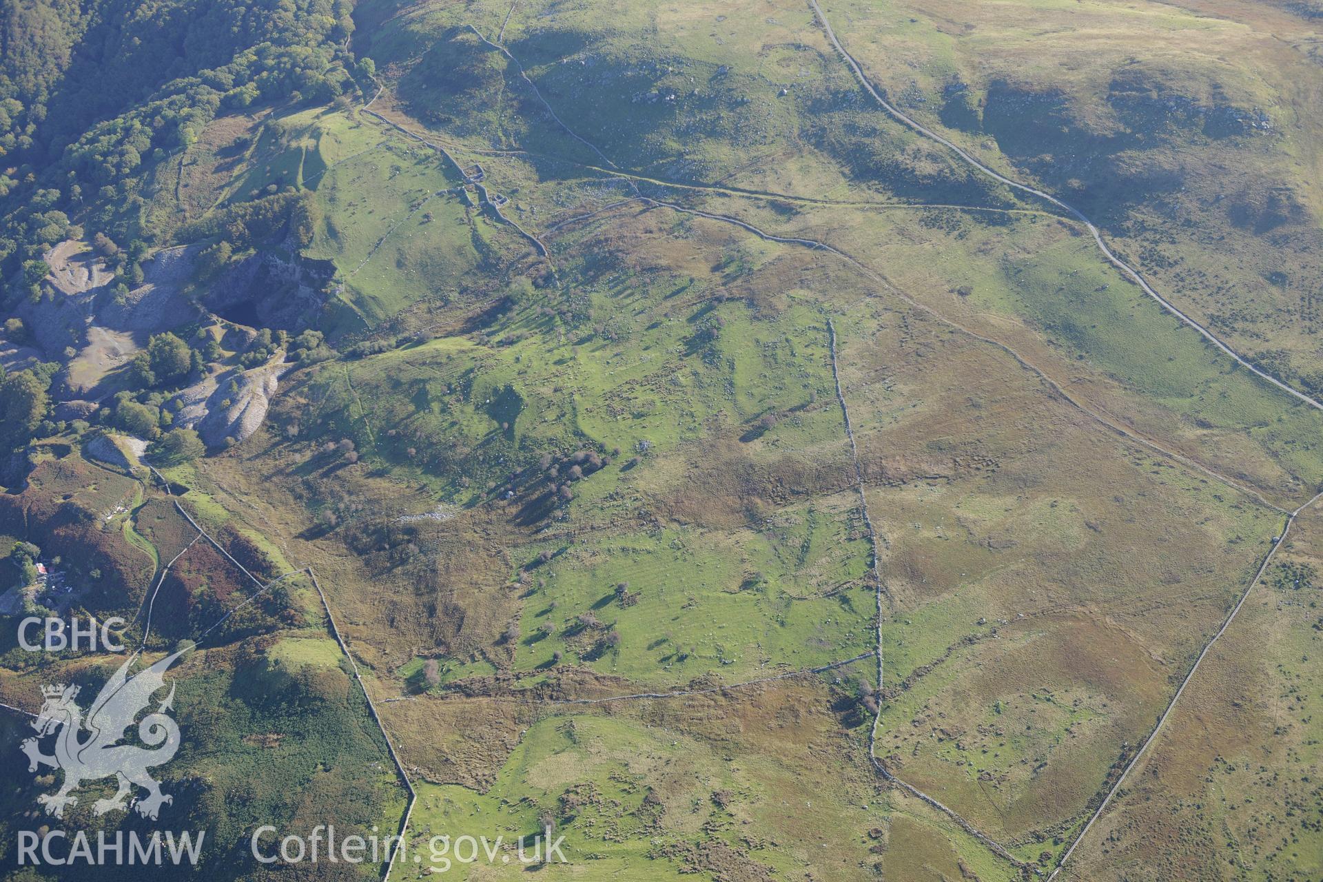Hen-ddol and Goleuwern slate quarries, and Bryn Seward Settlement, near Fairbourne. Oblique aerial photograph taken during the Royal Commission's programme of archaeological aerial reconnaissance by Toby Driver on 2nd October 2015.