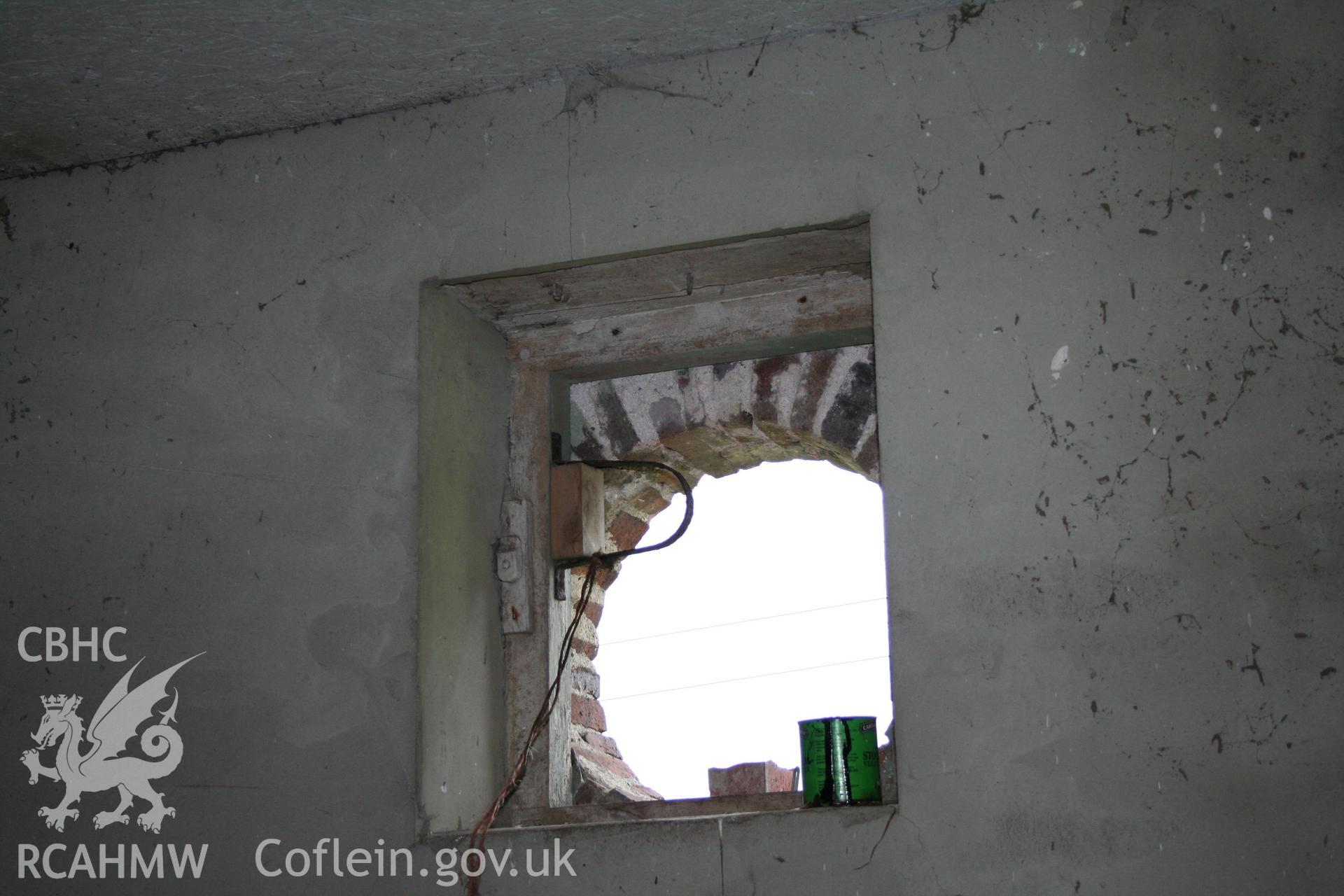 Interior view of engineering brick circular window. Photographic survey of the southern range of cowhouses at Tan-y-Graig Farm, Llanfarian. Conducted by Geoff Ward and John Wiles, 11th December 2006.