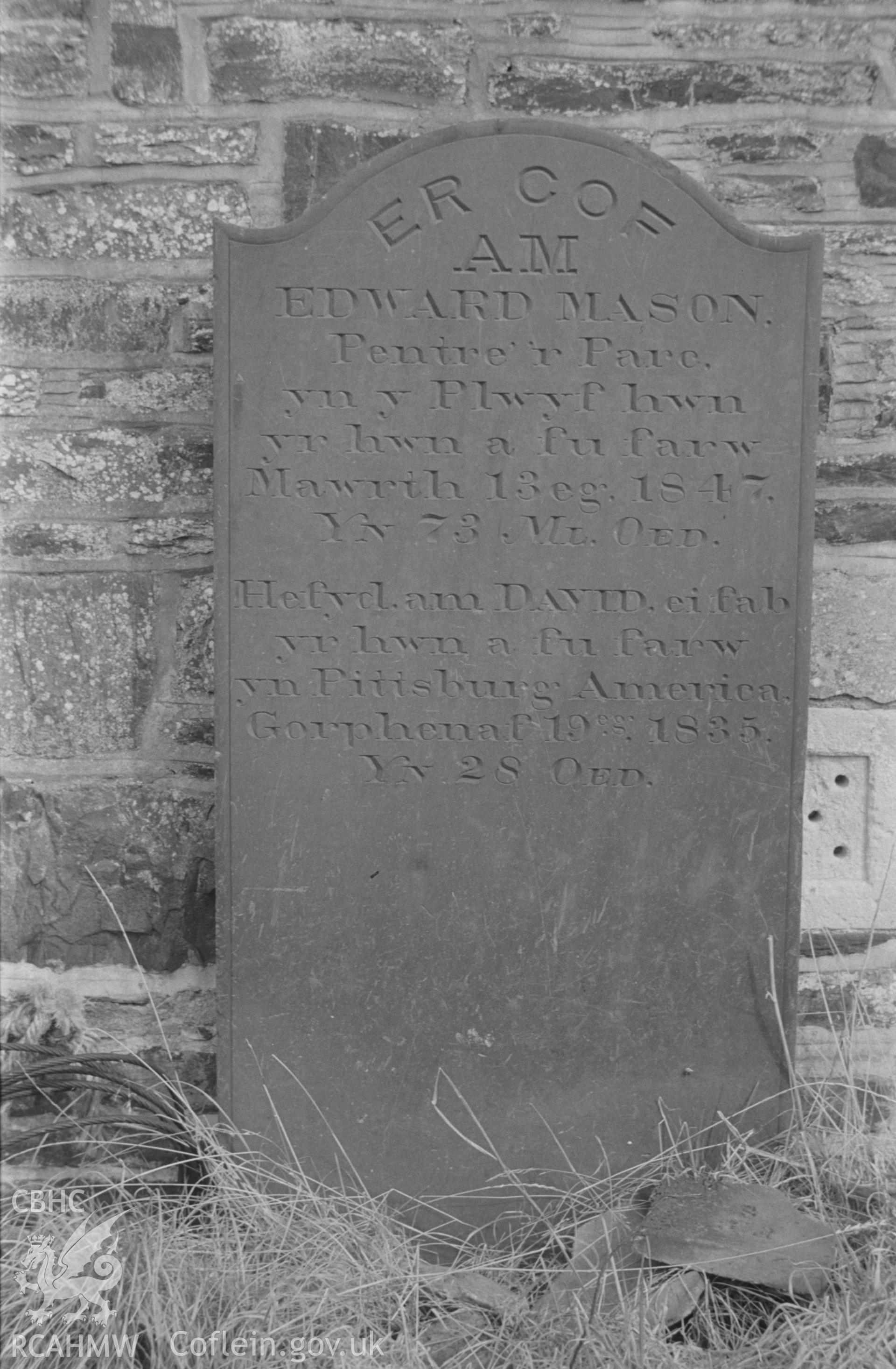 Digital copy of a black and white negative showing 1847 gravestone at St. Non's church, Llanerchaeron, in memory of Edward Mason, and his son David who died in Pittsburg, America, in 1835. Photographed by Arthur O. Chater in September 1966.
