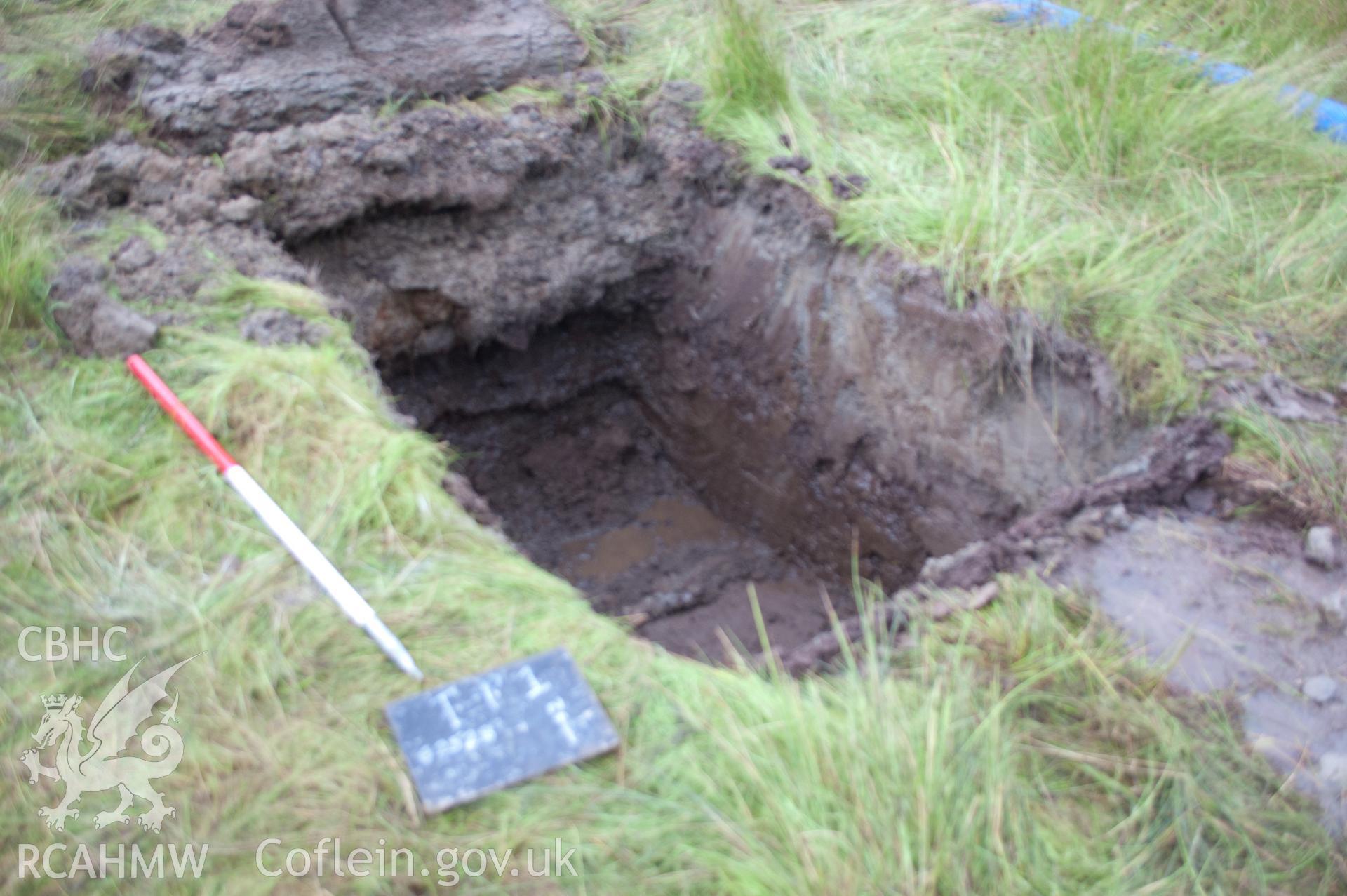 Digital photograph showing view from north west of launch pit 1 post excavation. Photographed during Gwynedd Archaeological Trust's archaeological watching brief of water main renewal in Dolgellau on 28th July 2017. Project no. G2528.