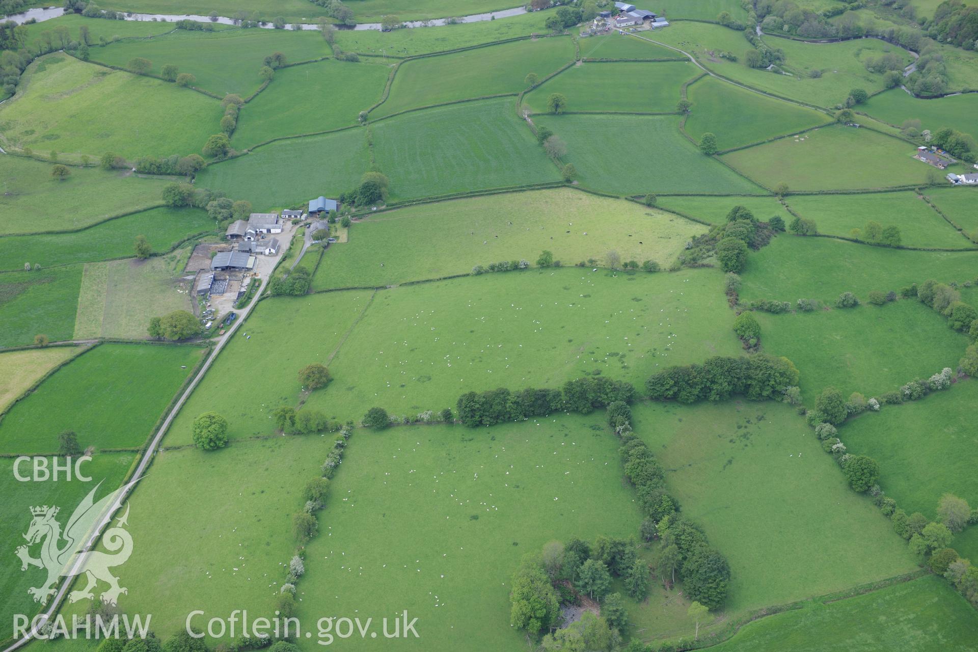 Possible hill fort site at Ty Newydd. Oblique aerial photograph taken during the Royal Commission's programme of archaeological aerial reconnaissance by Toby Driver on 3rd June 2015.