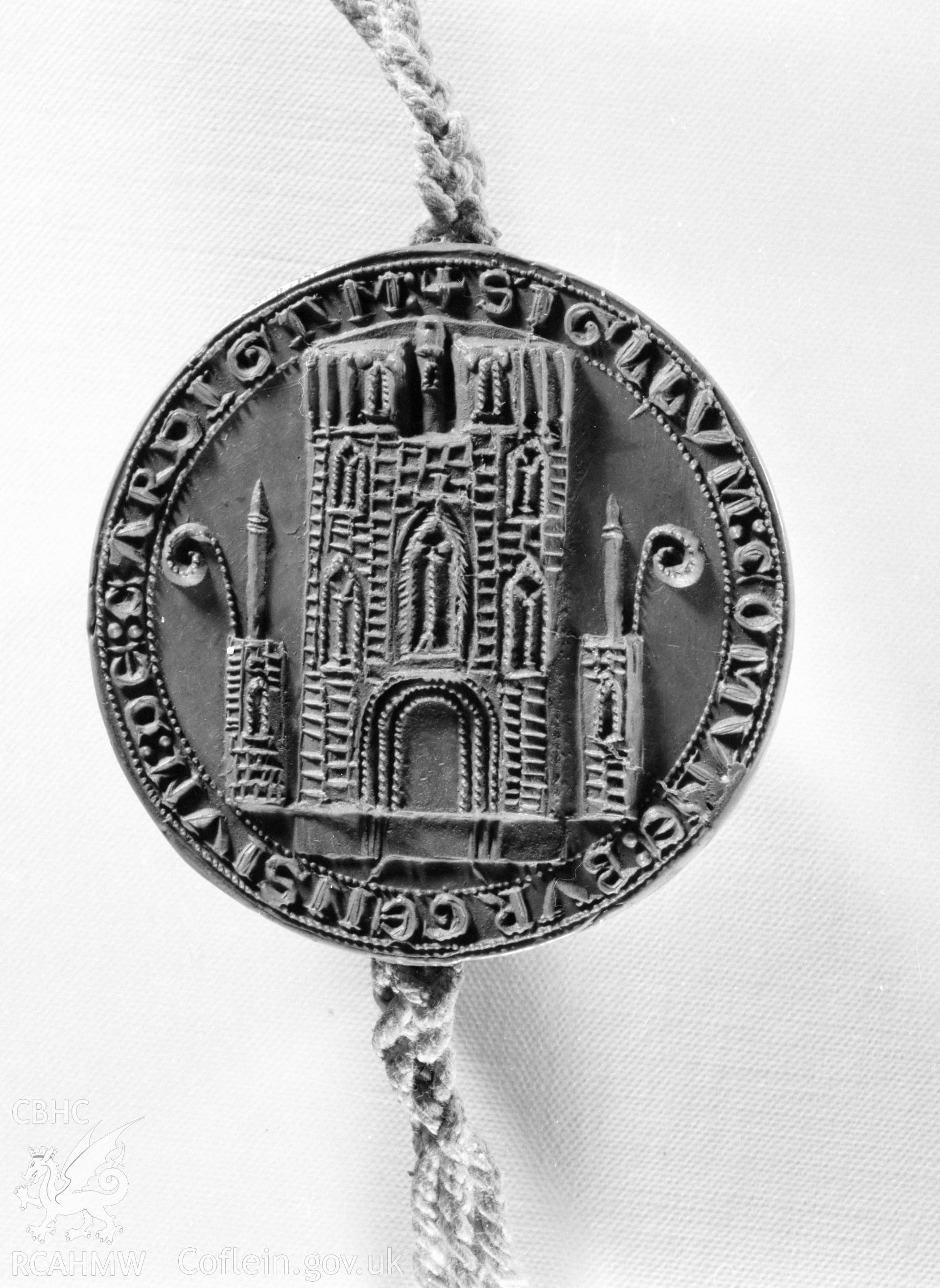 Digital copy of a black and white negative showing front side of the Cardigan Seal.