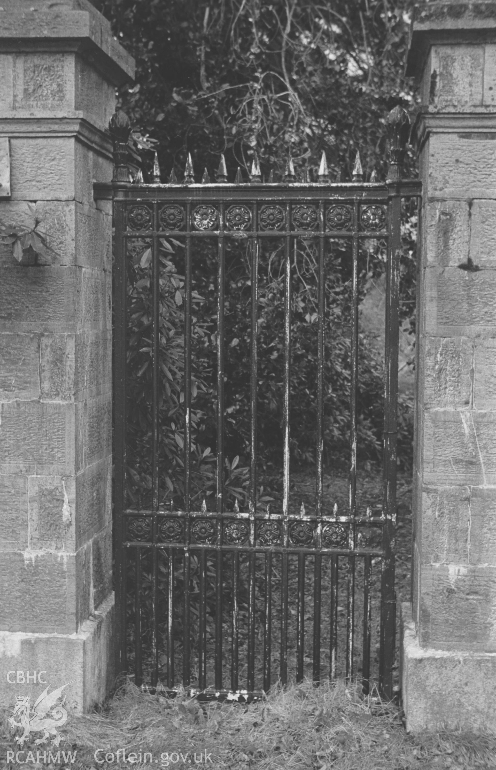 Digital copy of a black and white negative showing the west gate in the south gateway of Trawscoed mansion gates. Photographed by Arthur O. Chater on 17th January 1968 looking north north west from Grid Reference SN 672 727.