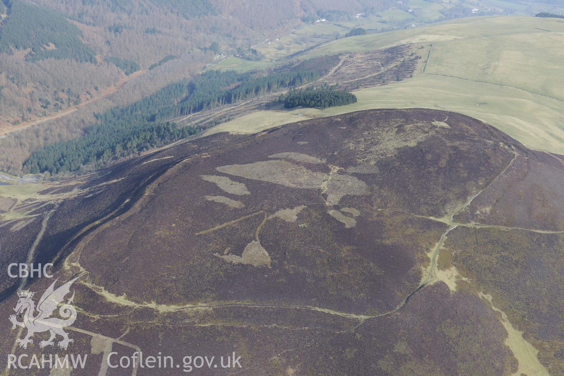 Foel Fenlli Hillfort, between Ruthin and Mold. Oblique aerial photograph taken during the Royal Commission?s programme of archaeological aerial reconnaissance by Toby Driver on 28th February 2013.
