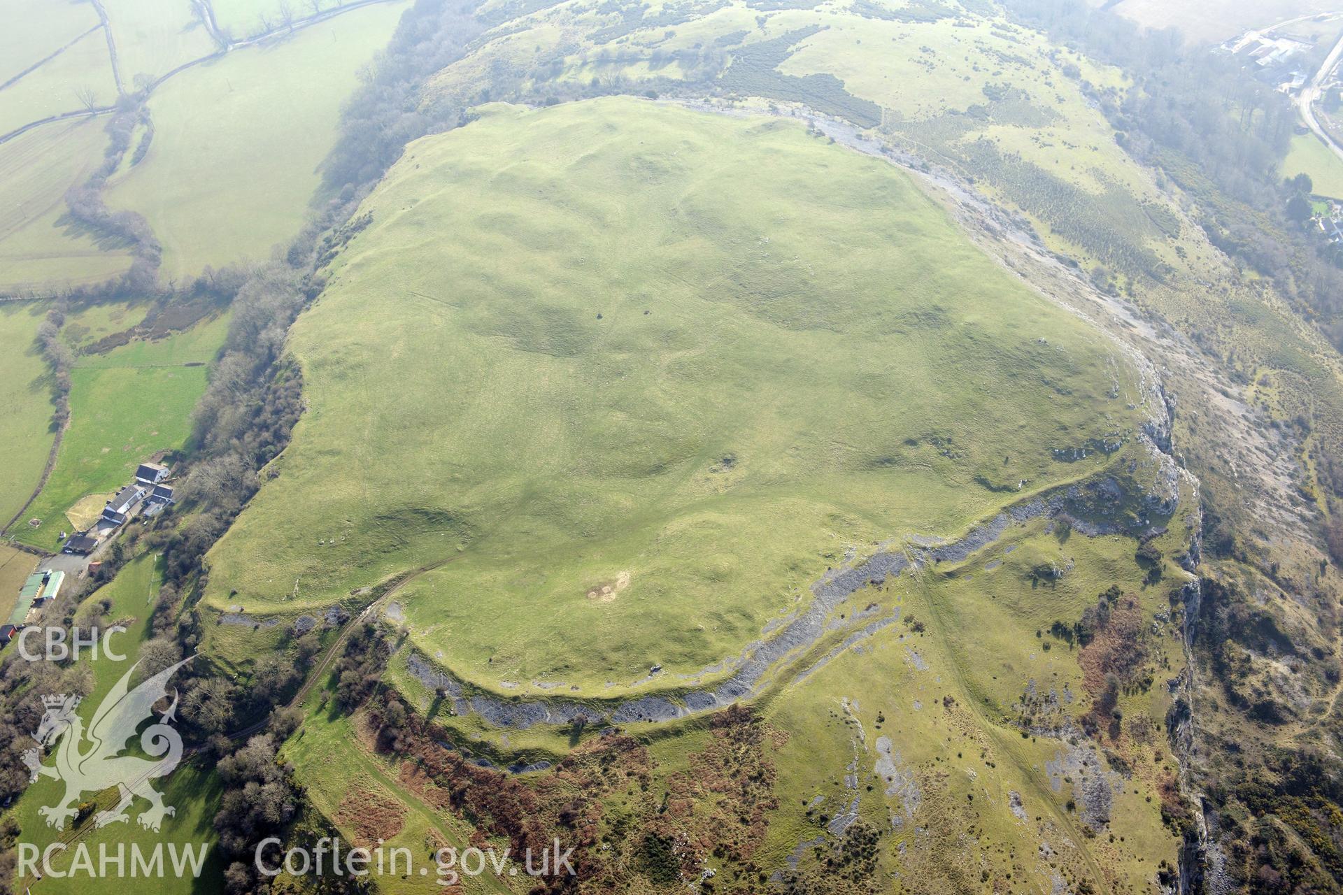 Pen-y-Corddyn-Mawr hillfort, Abergele. Oblique aerial photograph taken during the Royal Commission?s programme of archaeological aerial reconnaissance by Toby Driver on 28th February 2013.