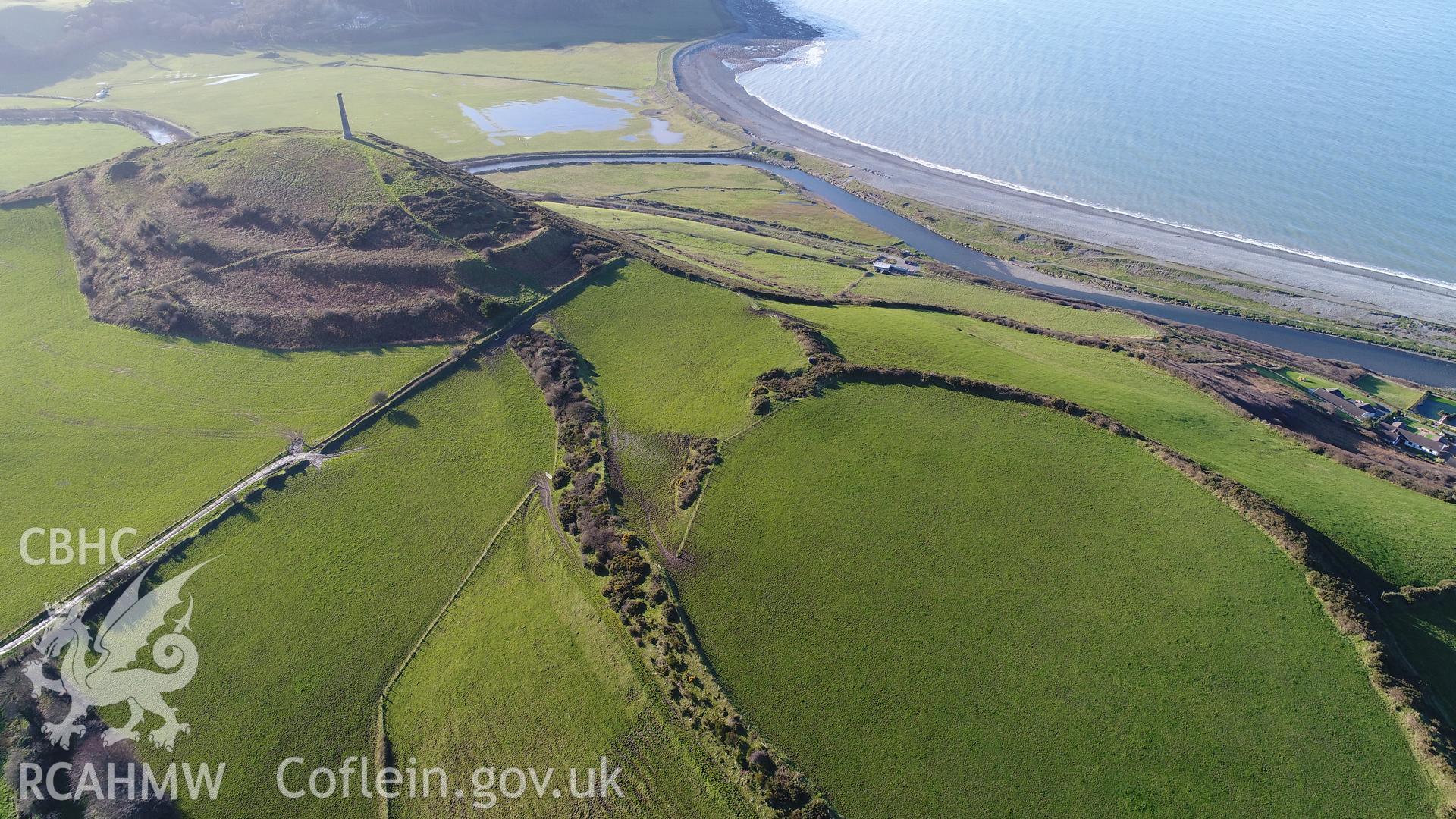 View of Pen Dinas hillfort from the north-east. CHERISH Project DJI drone photo survey of Pen Dinas Hillfort and the Wellington Monument. ? Crown: CHERISH PROJECT 2017. Produced with EU funds through the Ireland Wales Co-operation Programme 2014-2020. All material made freely available through the Open Government Licence.