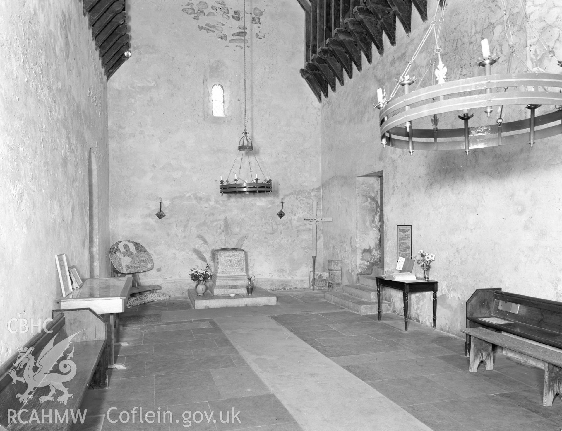 Digital copy of a black and white negative showing an interior view of Penmon priory taken 1976.