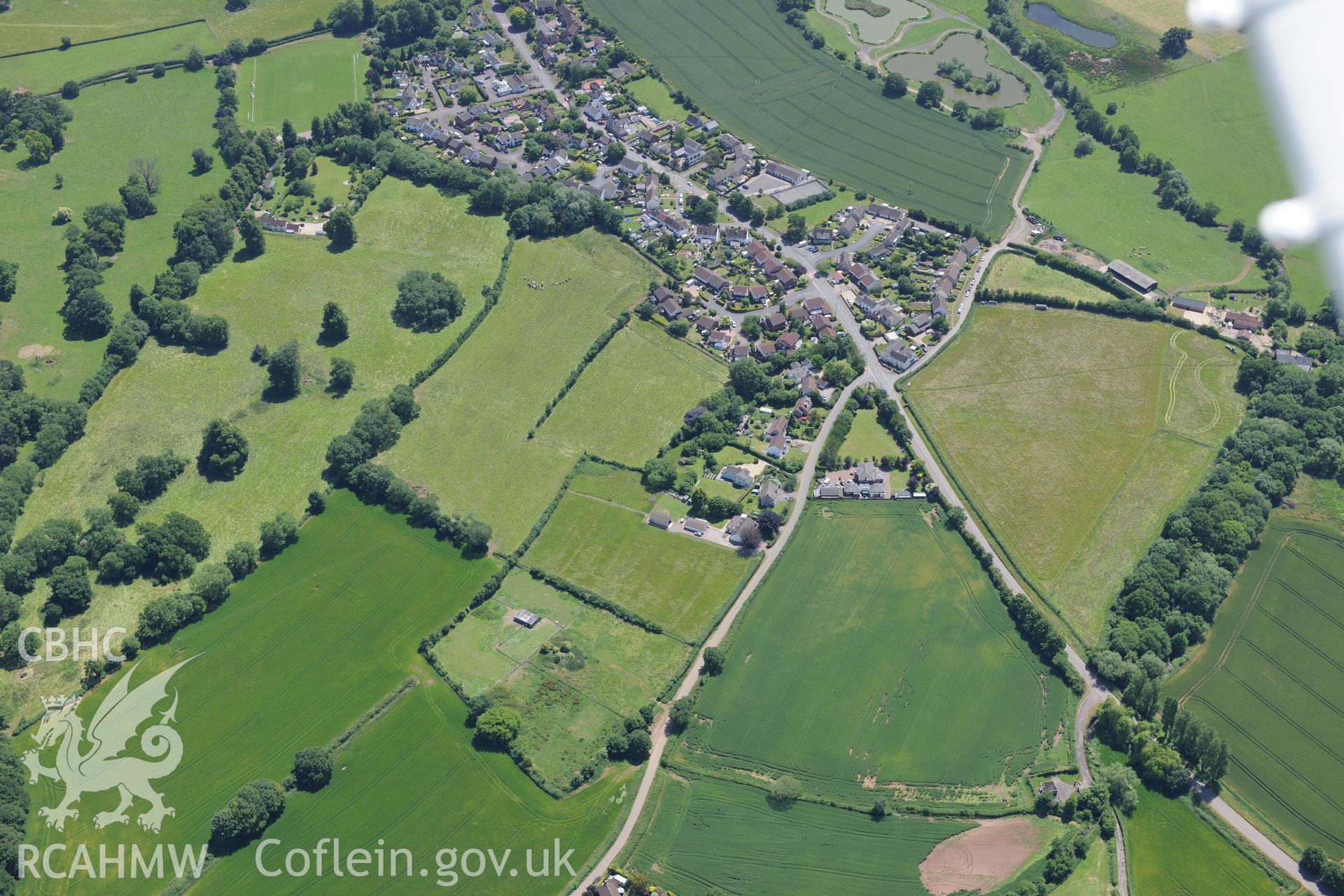 The village of Mathern, near Chepstow. Oblique aerial photograph taken during the Royal Commission's programme of archaeological aerial reconnaissance by Toby Driver on 29th June 2015.