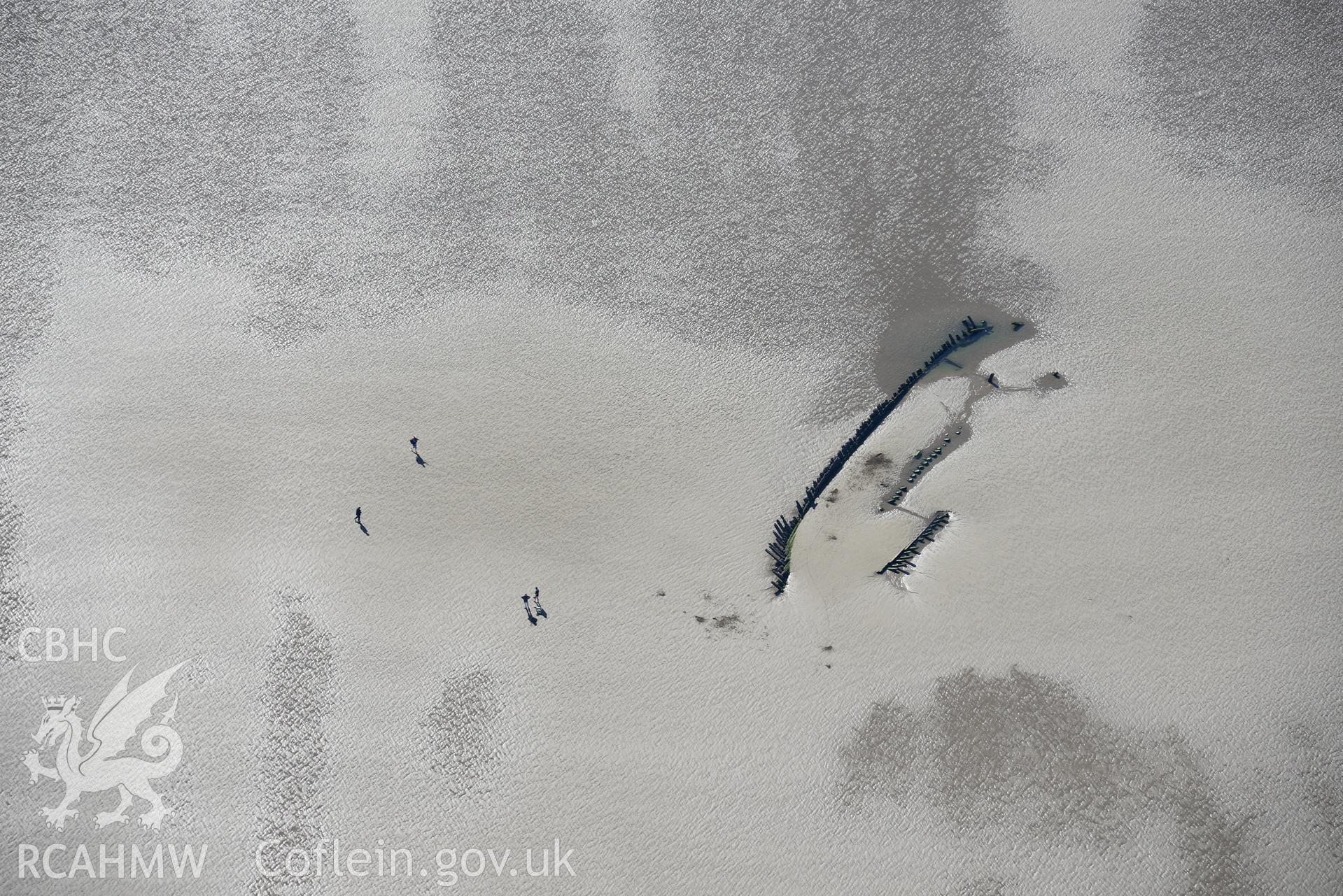 An unnamed wreck on the southern part of the Cefn Sidan Sands near Pembrey, Llanelli. Oblique aerial photograph taken during the Royal Commission's programme of archaeological aerial reconnaissance by Toby Driver on 30th September 2015.