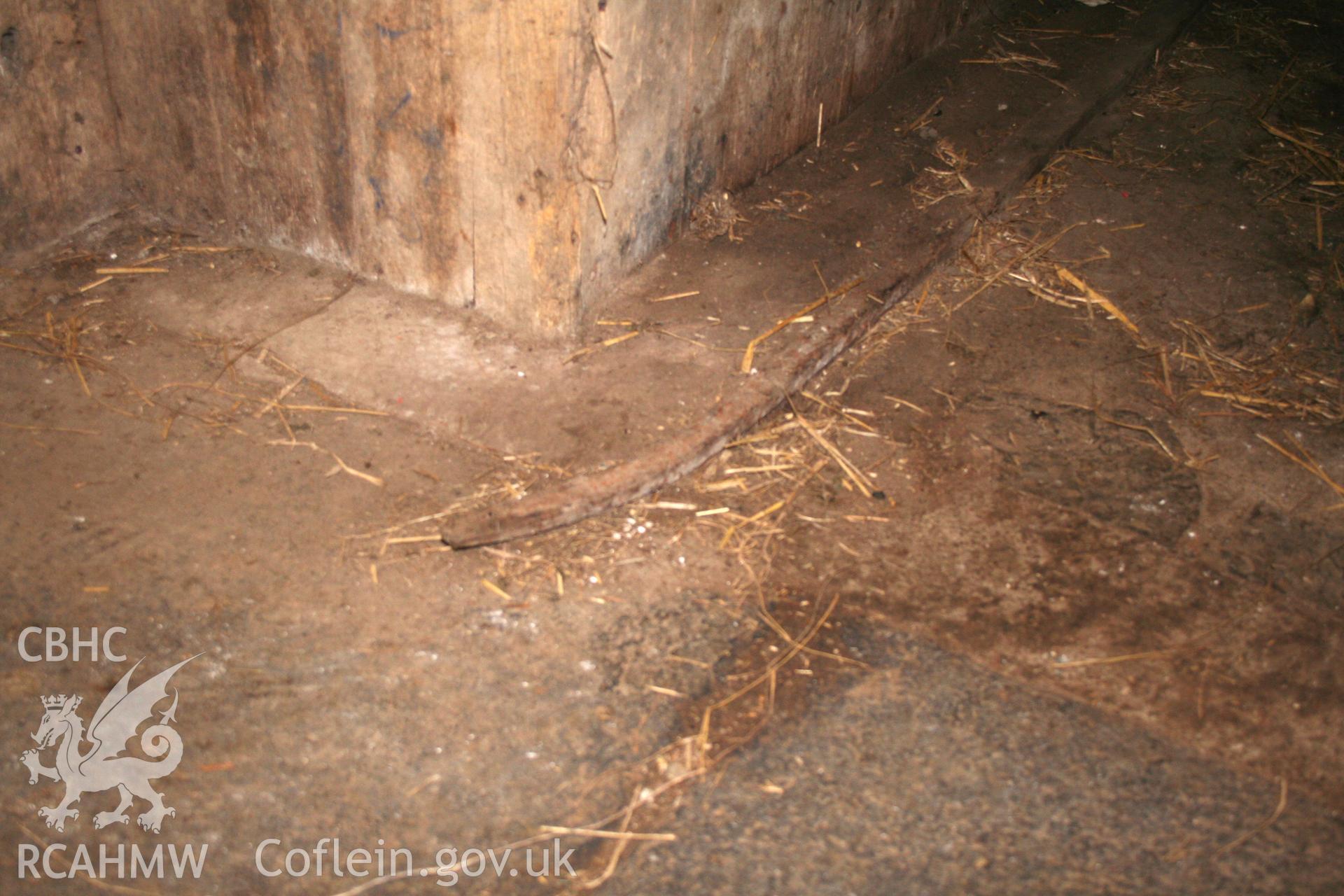 Interior view of concrete flooring. Photographic survey of the northern range of cattle-shelters at Tan-y-Graig Farm, Llanfarian, conducted by Geoff Ward and John Wiles, 11th December 2006.