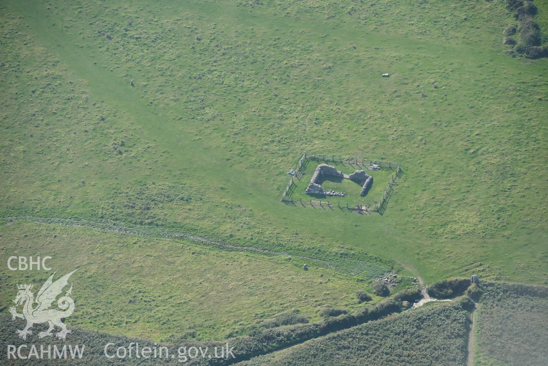 St. Non's chapel, St. Non's Bay, south of St. Davids. Oblique aerial photograph taken during the Royal Commission's programme of archaeological aerial reconnaissance by Toby Driver on 30th September 2015.