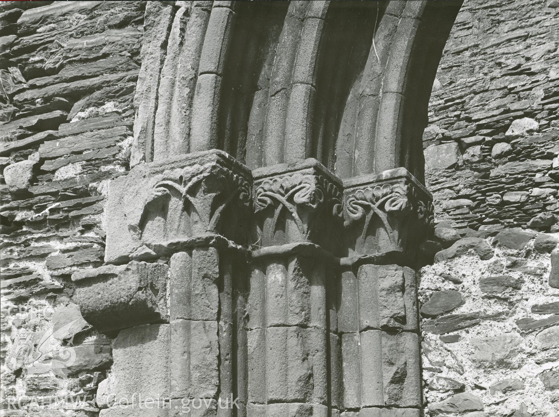 Digitised copy of a black and white photograph showing door to south aisle on north side of cloister at Valle Crucis Abbey, taken by F.H. Crossley, 1949. Copied from print as negative held by NMR England (Historic England)