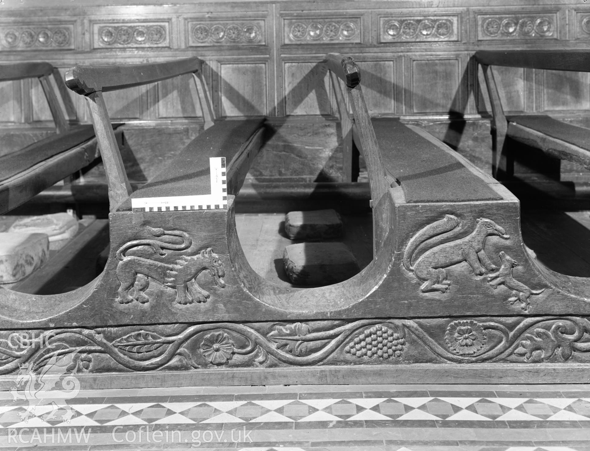 Digital copy of a black and white negative showing carved wooden pews at Rhug Chapel, taken by Department of Environment, 1976.