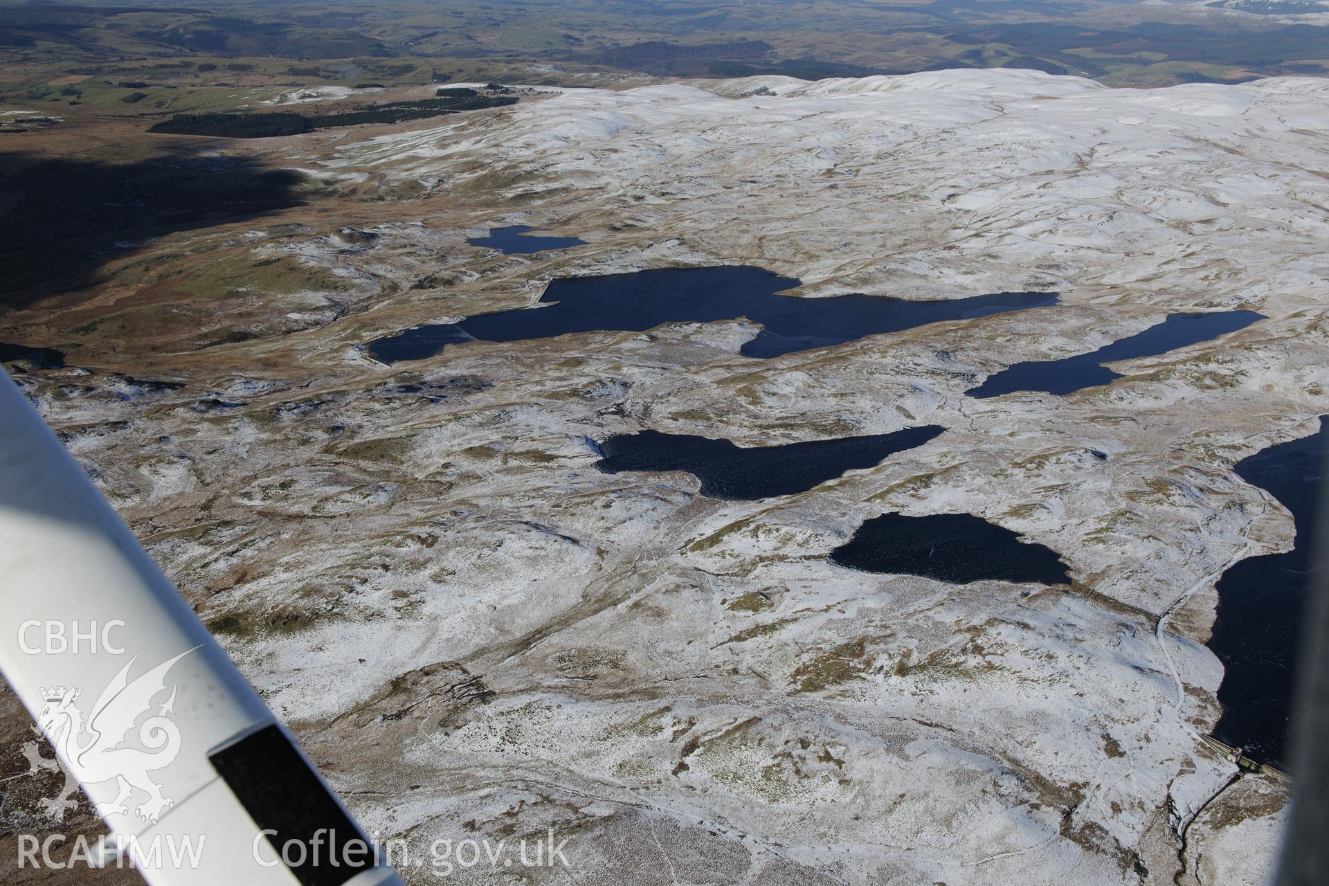Teifi Pools water scheme including Llyn Bach; Llyn Pond Gwaith and Llyn Teifi, at the source of the river Teifi in the Cambrian Mountains, west of Rhayader. Oblique aerial photograph taken during the Royal Commission's programme of archaeological aerial reconnaissance by Toby Driver on 4th February 2015.