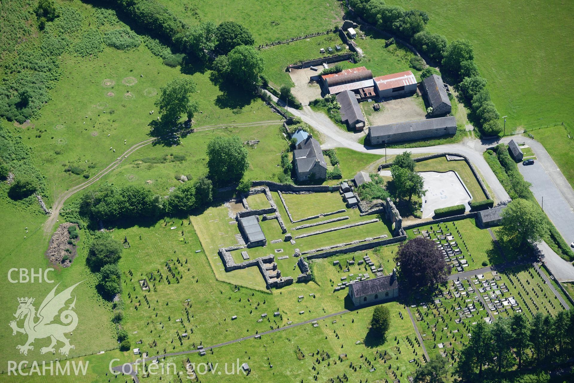 Abbey Farmhouse and St. Mary's church at Strata Florida abbey, Pontrhydfendigaid. Oblique aerial photograph taken during the Royal Commission's programme of archaeological aerial reconnaissance by Toby Driver on 30th June 2015.