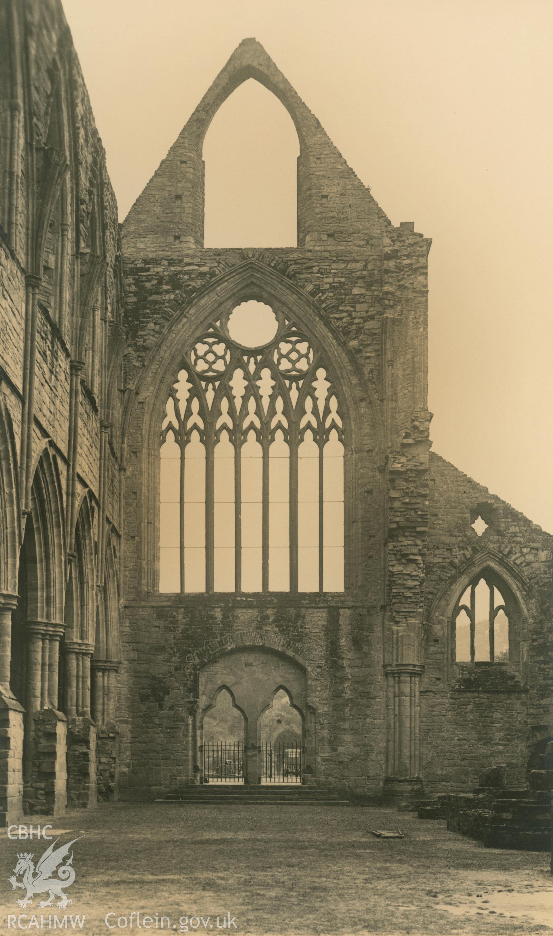 Digital copy of an albumen print showing a view of the nave looking west at Tintern Abbey.