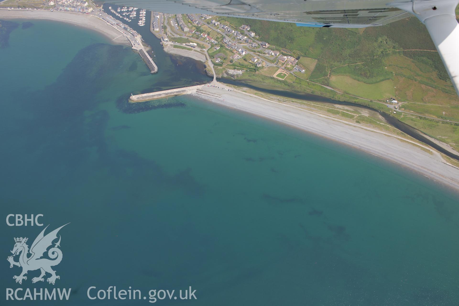 Aberystwyth Harbour. Oblique aerial photograph taken during the Royal Commission?s programme of archaeological aerial reconnaissance by Toby Driver on 12th July 2013.