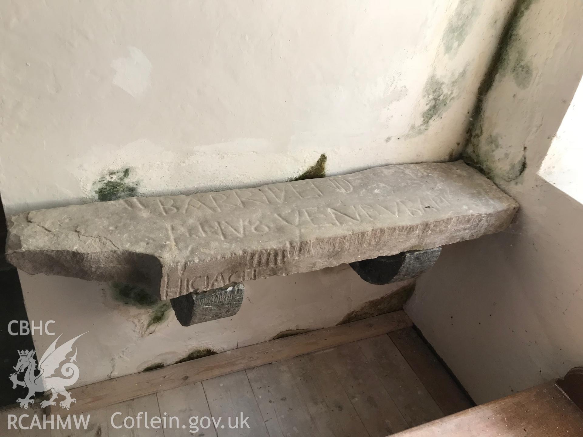 Colour photo showing inscribed bench inside the church of St. Odoceus and St. Margaret Marlos, Llandawke, taken by Paul R. Davis, 6th May 2018.