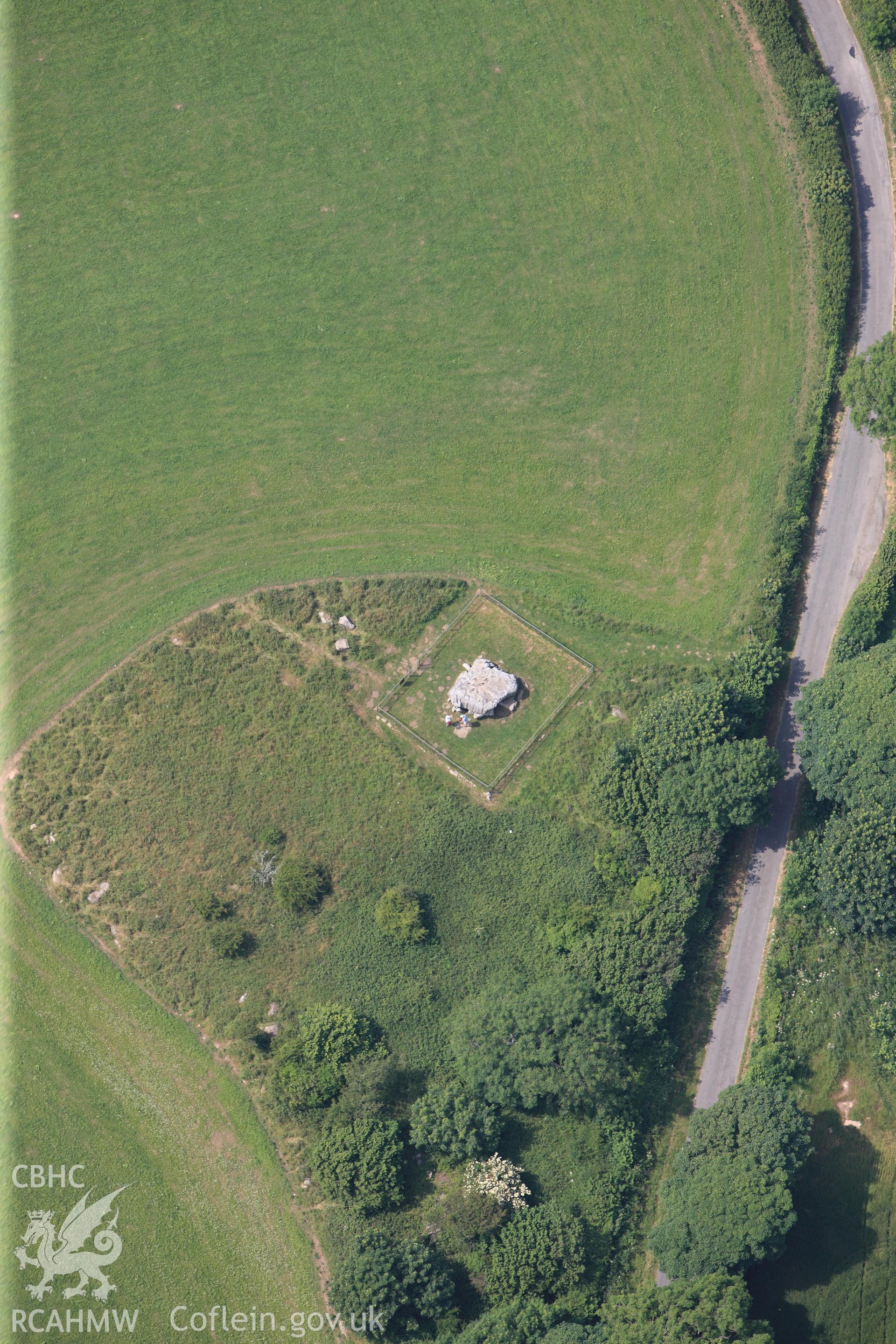 Lligwy Burial Chamber, near Moelfre. Oblique aerial photograph taken during the Royal Commission?s programme of archaeological aerial reconnaissance by Toby Driver on 12th July 2013.