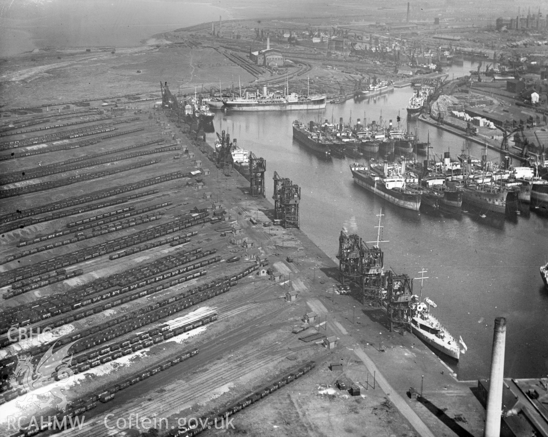 View of Queens Dock, Cardiff showing railway sidings, oblique aerial view. 5?x4? black and white glass plate negative.