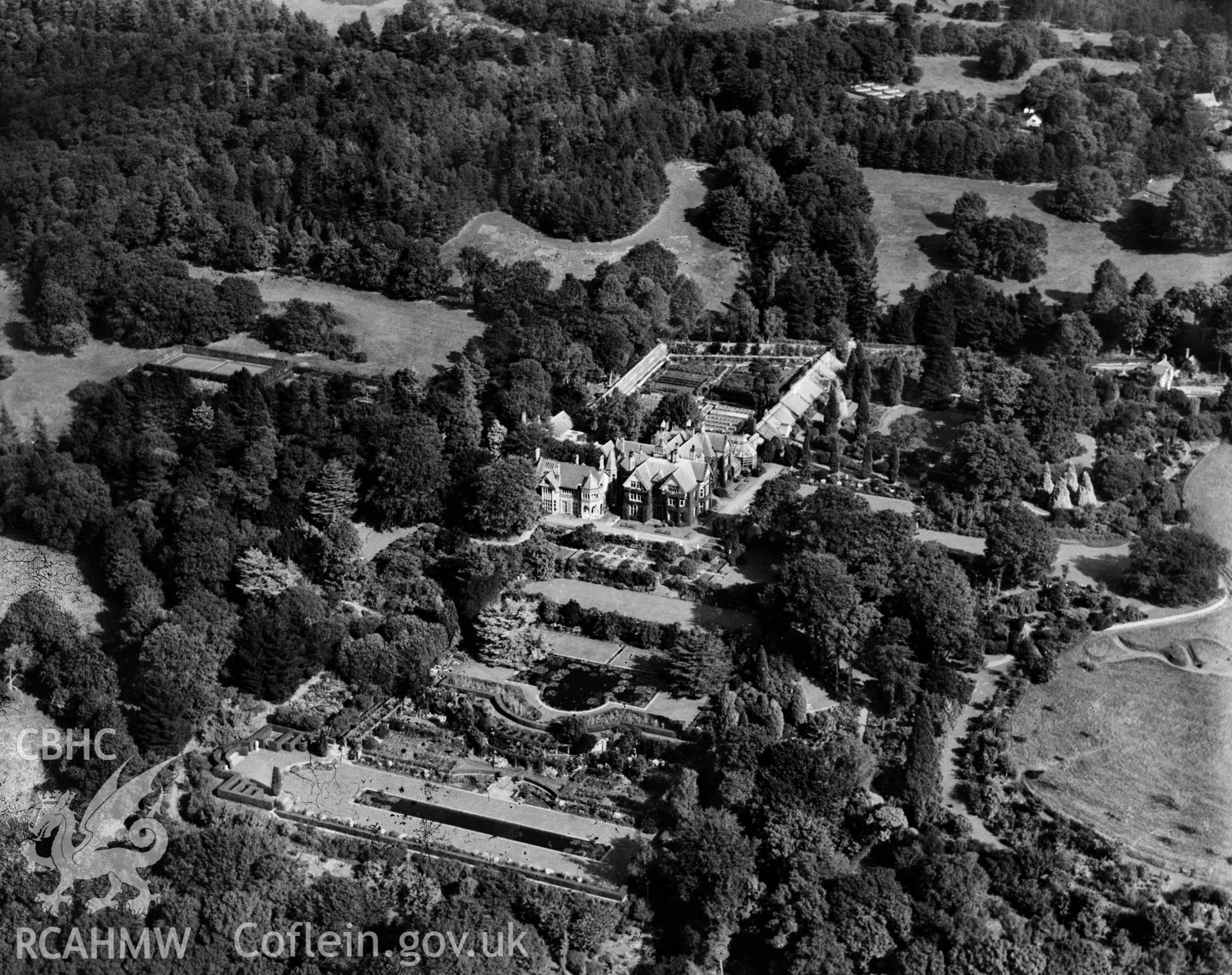 View of Bodnant House and gardens, oblique aerial view. 5?x4? black and white glass plate negative.