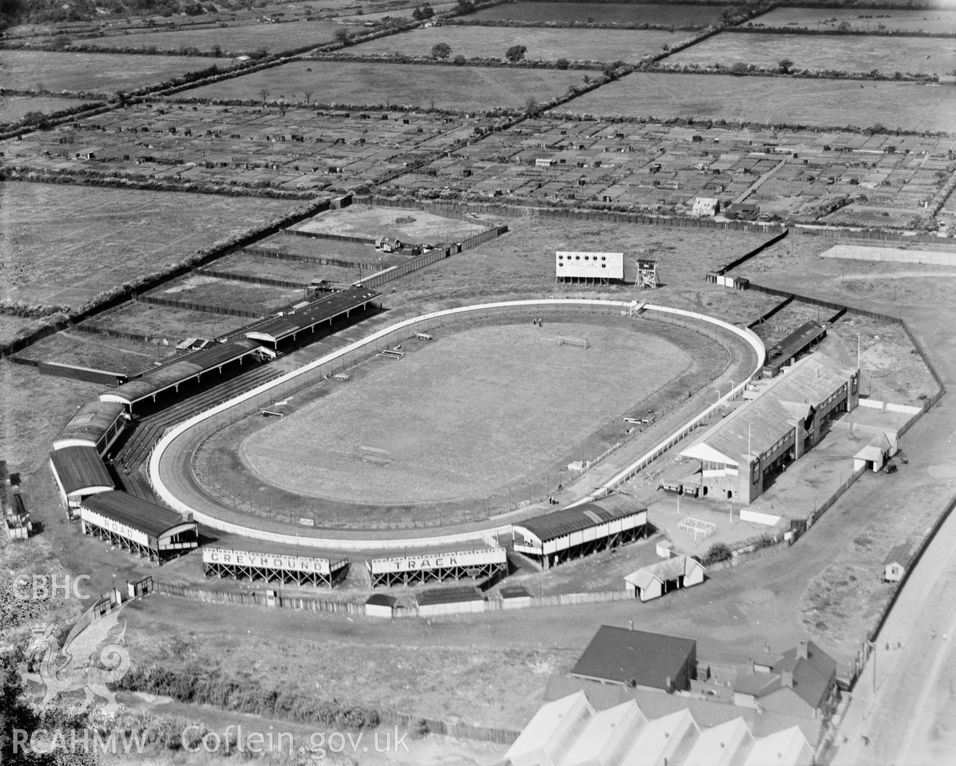 View of greyhound racing track, Sloper Road, Cardiff, oblique aerial view. 5?x4? black and white glass plate negative.