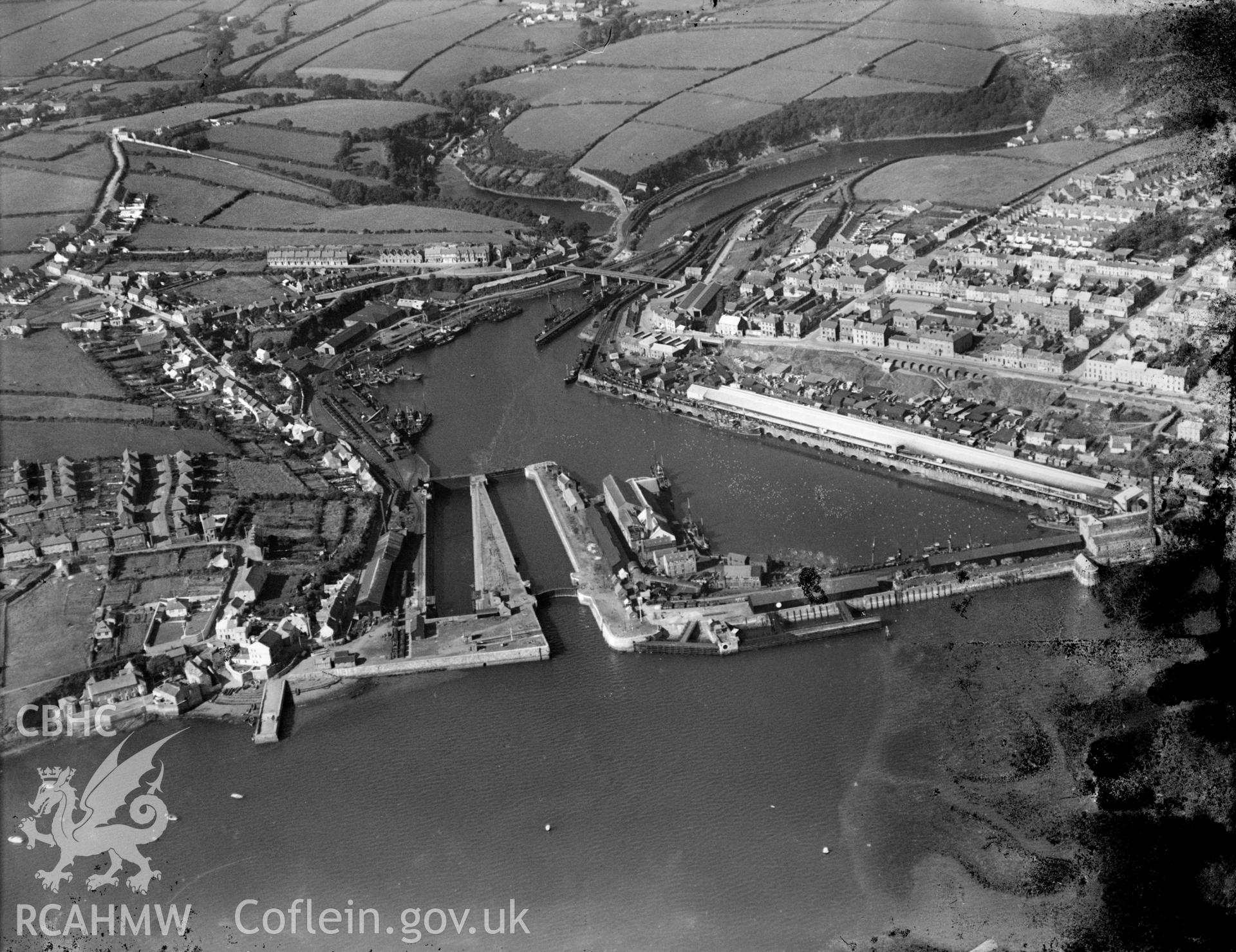 View of Milford Haven and docks, oblique aerial view. 5?x4? black and white glass plate negative.